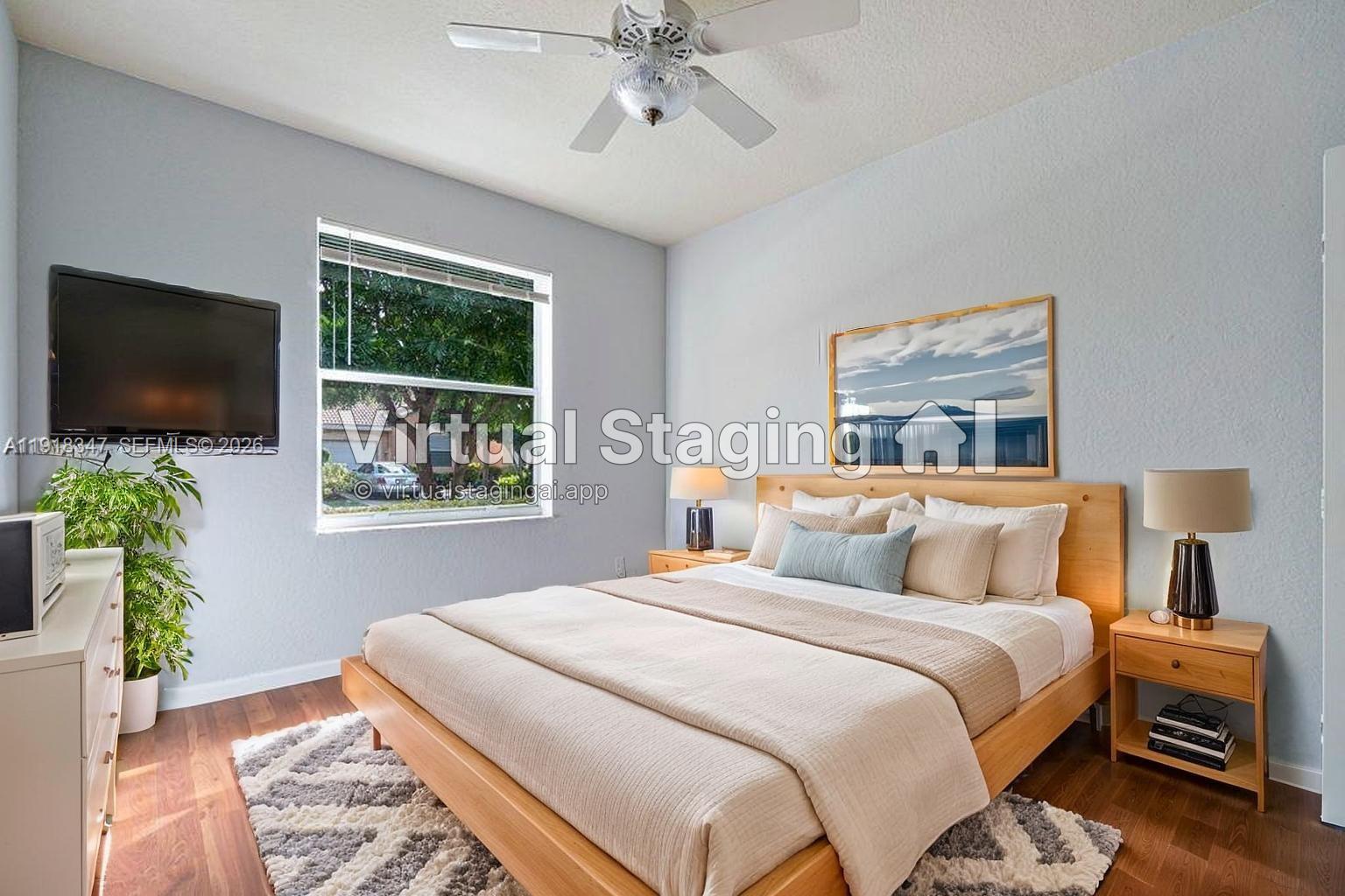 Spacious living room with panoramic views at 2437 Coral Trace Cir - Townhouse in Delray Beach