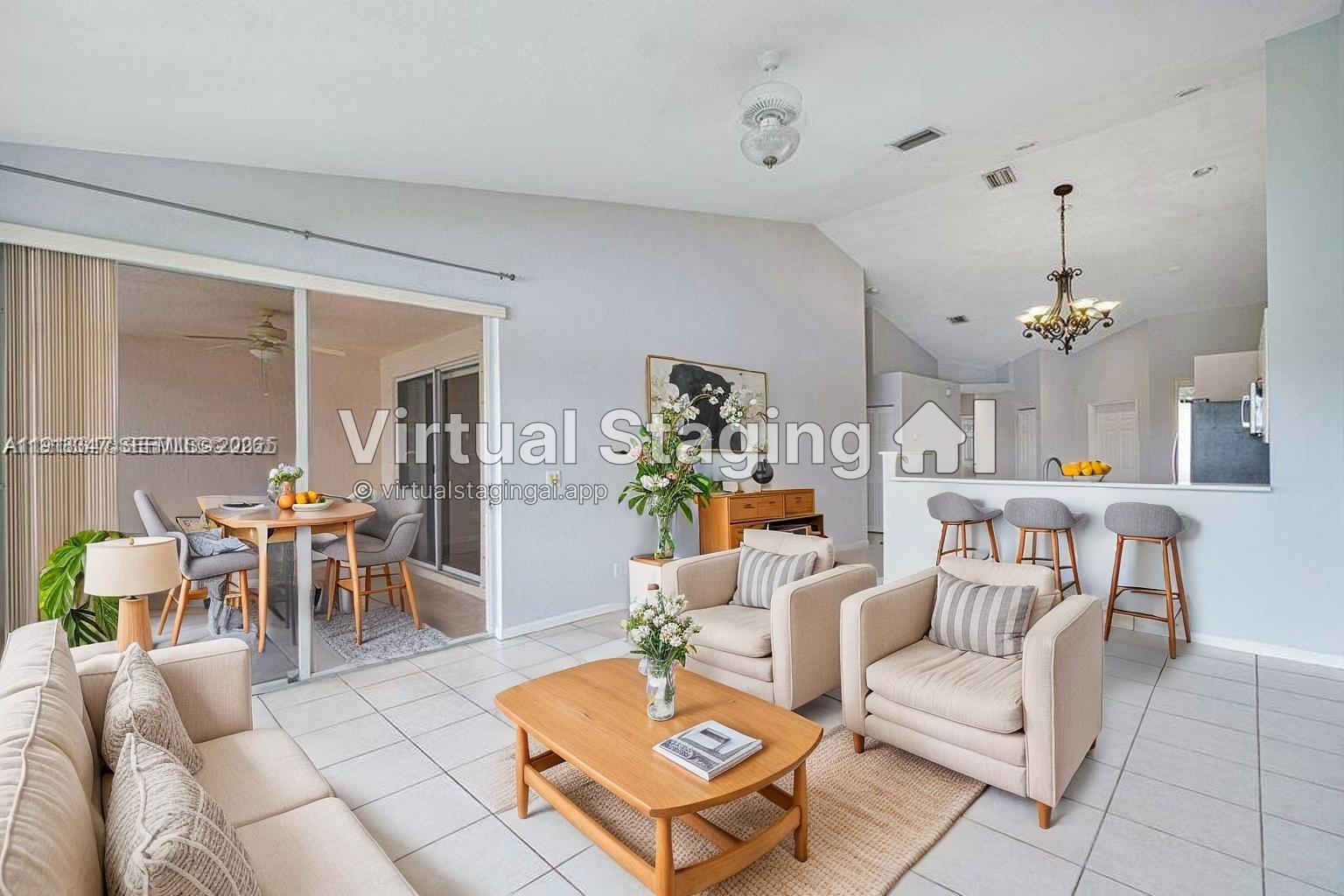 Modern kitchen with designer features at 2437 Coral Trace Cir - Townhouse in Delray Beach