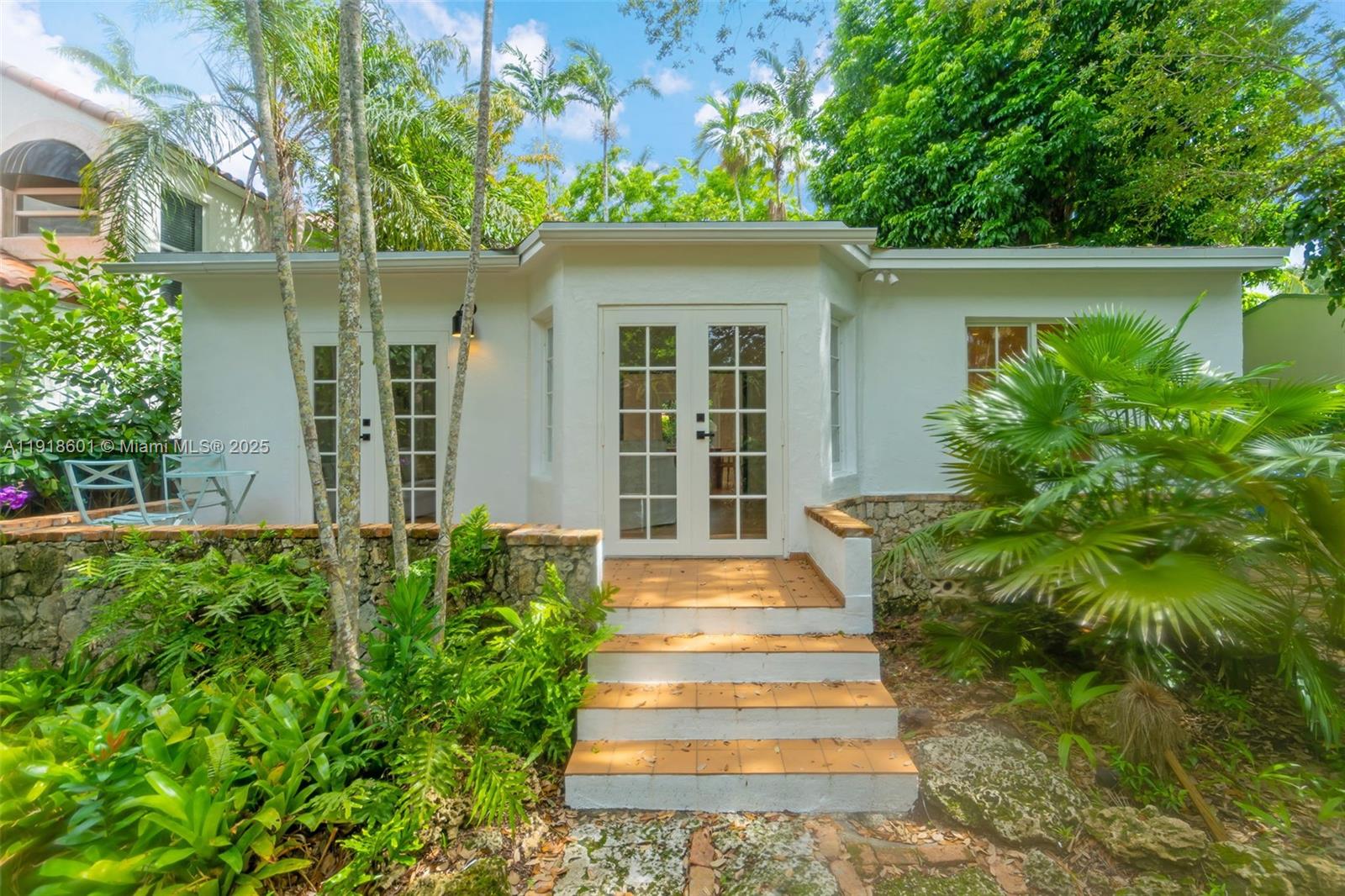 South Coconut Grove's prestigious street of El Prado! Instantly feel the distinctive charm of a space crafted for bothcomfort and character. With warm hardwood floors, ample natural light, and a seamless layout, the home exudesan inviting ambiance and undeniable allure. From the moment you arrive, you are enveloped in an environmentthat harmonizes tranquility with the vibrant energy of Coconut Grove. Set on a generous 5,800-square-foot lotsurrounded by lush greenery, this treasure offers more than just a residence—it’s an unparalleled living experience.Featuring a new roof, air conditioning, kitchen, and appliances, this beautifully updated, completely furnished homeensures a smooth transition into your next chapter.