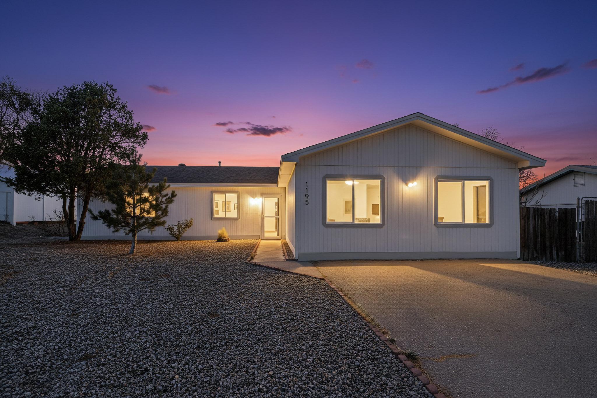 THIS is the home you've been waiting for!Perfectly located in the heart of Rio Rancho, this beautifully renovated property sits on a sprawling 1/2-acre lot with easy backyard access, giving you all the room you need for RVs, trailers, outdoor living, or future additions.Inside, the home feels brand new with upgrades everywhere you turnNew exterior & interior paint for a fresh, modern lookAll-new Shaker-style kitchen cabinetsStunning granite countertopsNew stainless steel appliance packageRemodeled bathrooms with stylish tile and new vanitiesNew light fixtures that brighten every roomNew plush carpetBrand-new roofNew water heaterA bright, open layout and a huge lot that's hard to find at this price, this home offers the perfect blend of comfort, style, and space