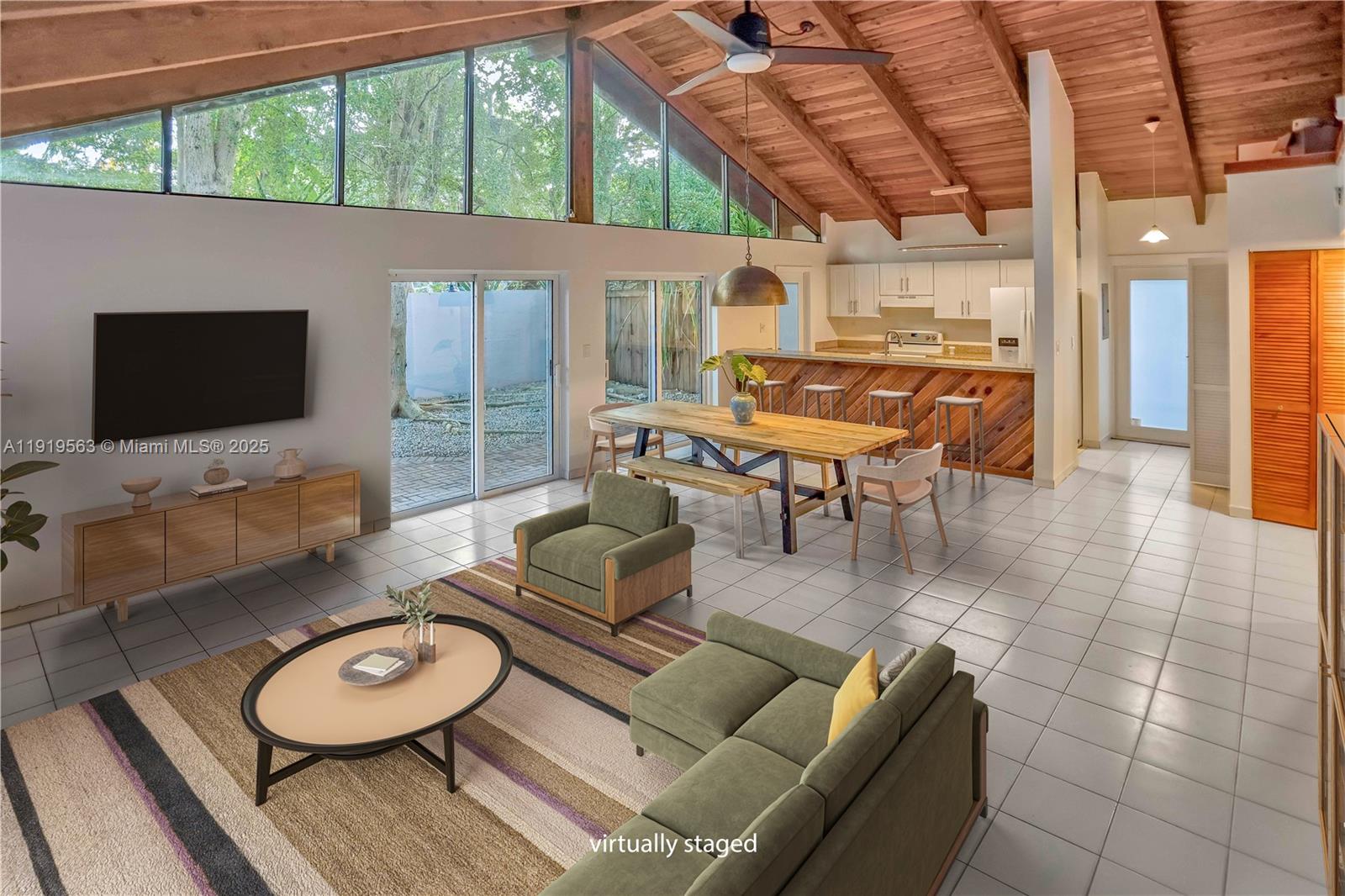 There's still time to be home for the holidays, in the heart of Coconut Grove! Quiet Allamanda is seconds, minutes to local parks, restaurants, shops, bars, bookstores and all that this fabulous area has to offer. Kitchen with bar/counter open to inviting social areas with vaulted ceilings and glorious windows. Vistas of mature vegetation and amazing outdoor entertainment spaces, great for alfresco dining or sunbathing in total privacy. Huge main ensuite with a loft; 2nd ensuite bedroom. Closets and storage galore. new washer/dryer. central a/c unit, on-site parking spaces and more. Pet friendly owner and neighborhood. Awesome area strategically situated for easy access to Miami Intl. Airport, expressways, public transport, Brickell/Downtown, Coral Gables, our glorious beaches.