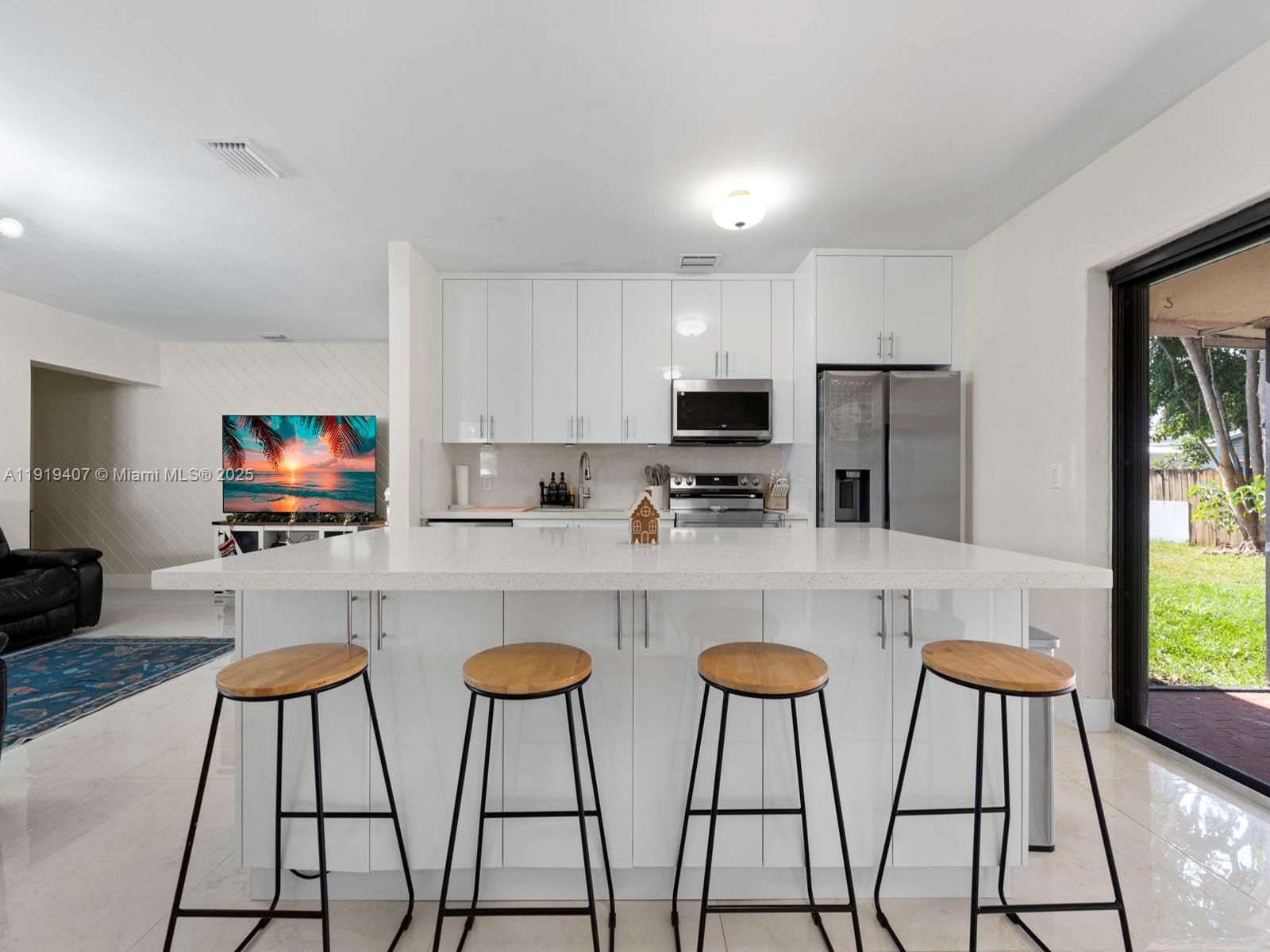 CHARMING AND MOVE-IN READY 3-BEDROOM, 2-BATHROOM HOME, PERFECT FOR A GROWING FAMILY. THIS LOVELY PROPERTY FEATURES A SPACIOUS ISLAND KITCHEN IDEAL FOR DAILY MEALS AND FAMILY GATHERINGS, BEAUTIFULLY REMODELED BATHROOMS, AND TILE FLOORING THROUGHOUT FOR EASY MAINTENANCE. BRAND-NEW AC DUCTS TO KEEP YOUR HOME FRESH YEAR-ROUND. • NEW SEPTIC TANK FOR WORRY-FREE LIVING. • CUSTOM-CRAFTED WOODEN KITCHEN AND CLOSETS, BLENDING STYLE AND FUNCTIONALITY. • NEW ELECTRICAL SYSTEM AND PANELS FOR PEACE OF MIND. ROOF LIFE IS 10-15 YEARS, PADDED PEACE OF MIND AND LONG-TERM VALUE. WARM AND WELCOMING, THIS HOME OFFERS COMFORT, FUNCTIONALITY, AND THE PERFECT SPACE TO CREATE LASTING MEMORIES. CONVENIENTLY LOCATED NEAR SCHOOLS, PARKS, SHOPPING CENTERS, AND MAJOR ROADWAYS