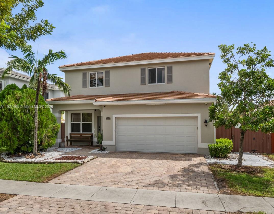 Welcome to this spacious 4BR/2.5BA lakefront home in the desirable Antillean Community of of Isles of Oasis, offering peaceful water views, privacy, and a large backyard with room for a future pool. Inside, you’re greeted by the living/family room that flows into the dining area, with the kitchen conveniently to the side. Past the kitchen are the garage, half bath, laundry room, and a sun-filled breakfast nook overlooking the backyard and lake. Upstairs, all four bedrooms are generously sized, including a primary suite with a separate shower and bathtub. The home has been maintained and offers a great opportunity to personalize to your style, with a 2023 A/C for added peace of mind. Living here means enjoying a resort-style amenities, including a clubhouse, pool, splash park, gym, and playgrounds, all with low HOA fees. Conveniently Located near Turnpike exit, Baptist Hospital, Homestead Pavilion Shopping Plaza, Publix, Starbucks, dining, top schools, parks, Biscayne National Park, and quick access to the Florida Keys. This home offers space, value, a welcoming layout and a peaceful lakefront lifestyle, and the chance to make it your own in one of Homestead’s most sought-after communities. Come see the potential and the lifestyle waiting for you.