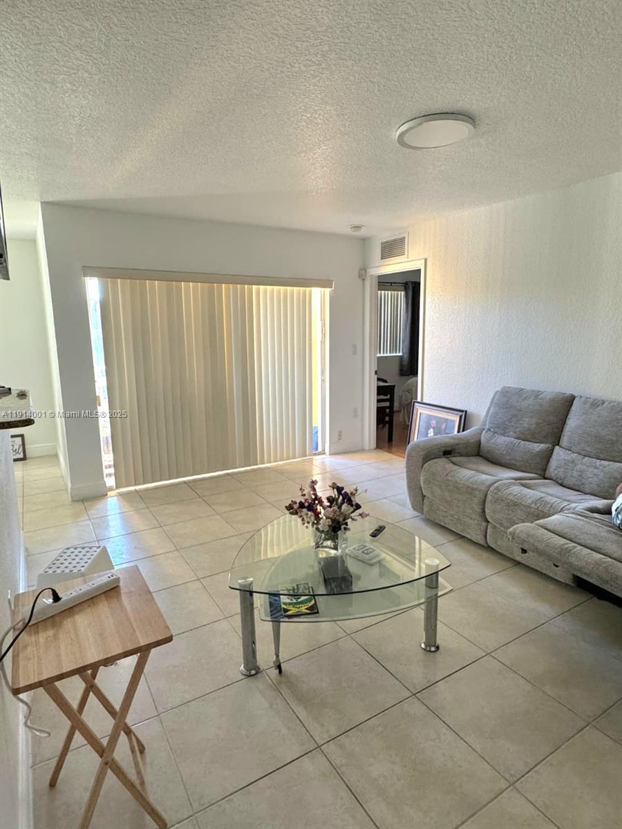 Beautiful 2 Bedroom / 2 Bathroom Condo in Cutler Bay – 2nd Floor | No Special Assessments | Tenant in Place. Excellent opportunity to own a well-maintained 2/2 condo located on the second floor of a desirable Cutler Bay community. This spacious unit features a functional split-bedroom layout, ample natural light, and comfortable living areas. No special assessments—buy with confidence. A long-term tenant is in place through April 2026, offering immediate and consistent rental income, making this a strong investment option. Ideal for investors or first-time homebuyers planning ahead. Convenient location near shopping, dining, parks, marina, and major highways.Perfect for anyone looking to expand their portfolio or secure a future primary residence in a growing area.