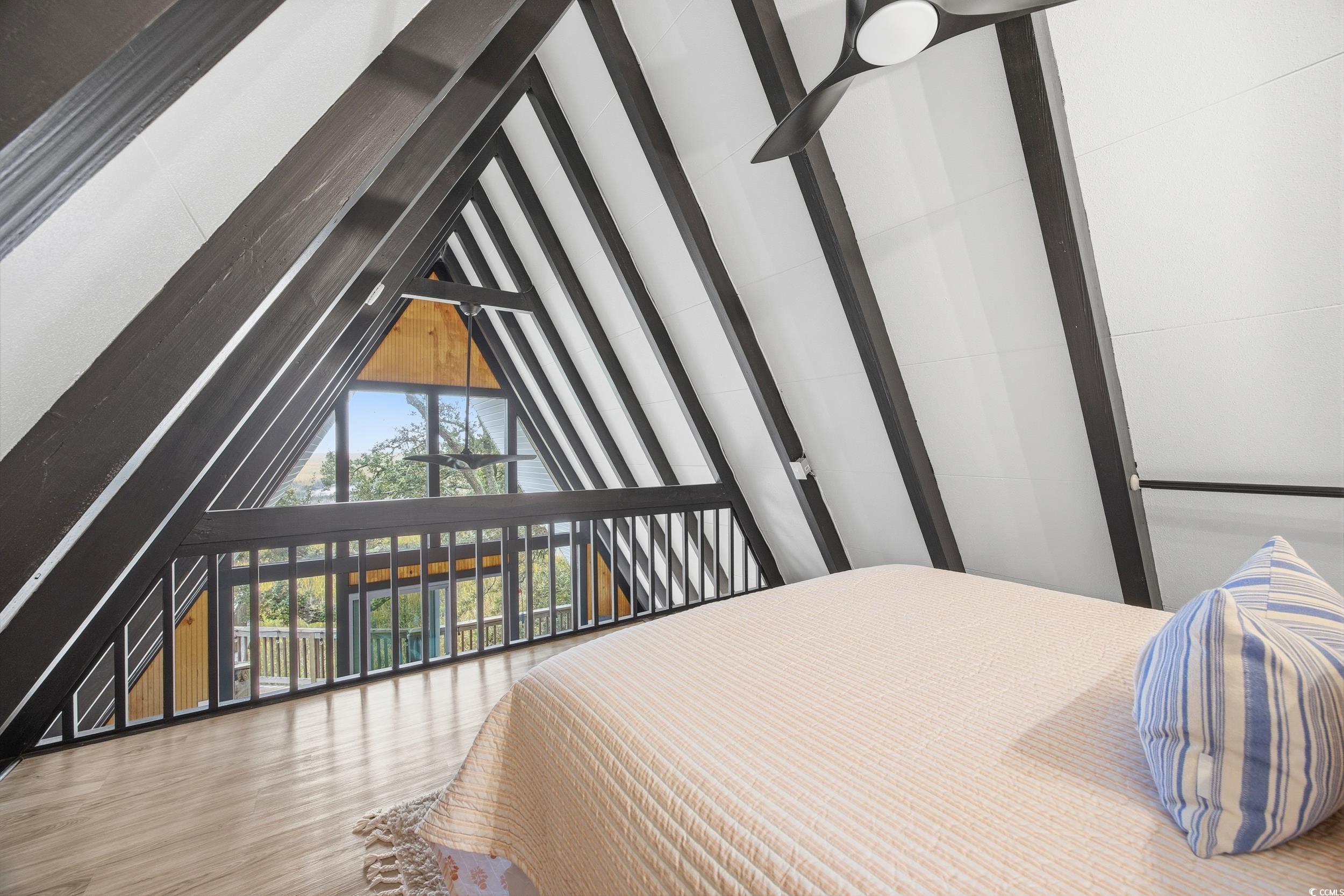 Bedroom featuring wood finished floors