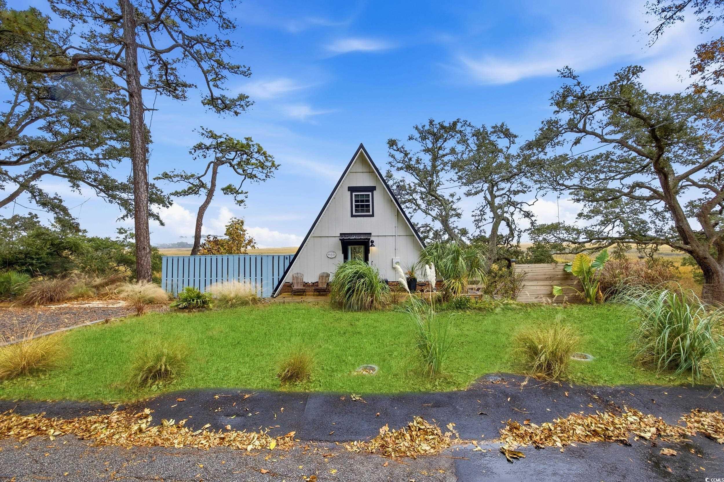 View of a-frame style home