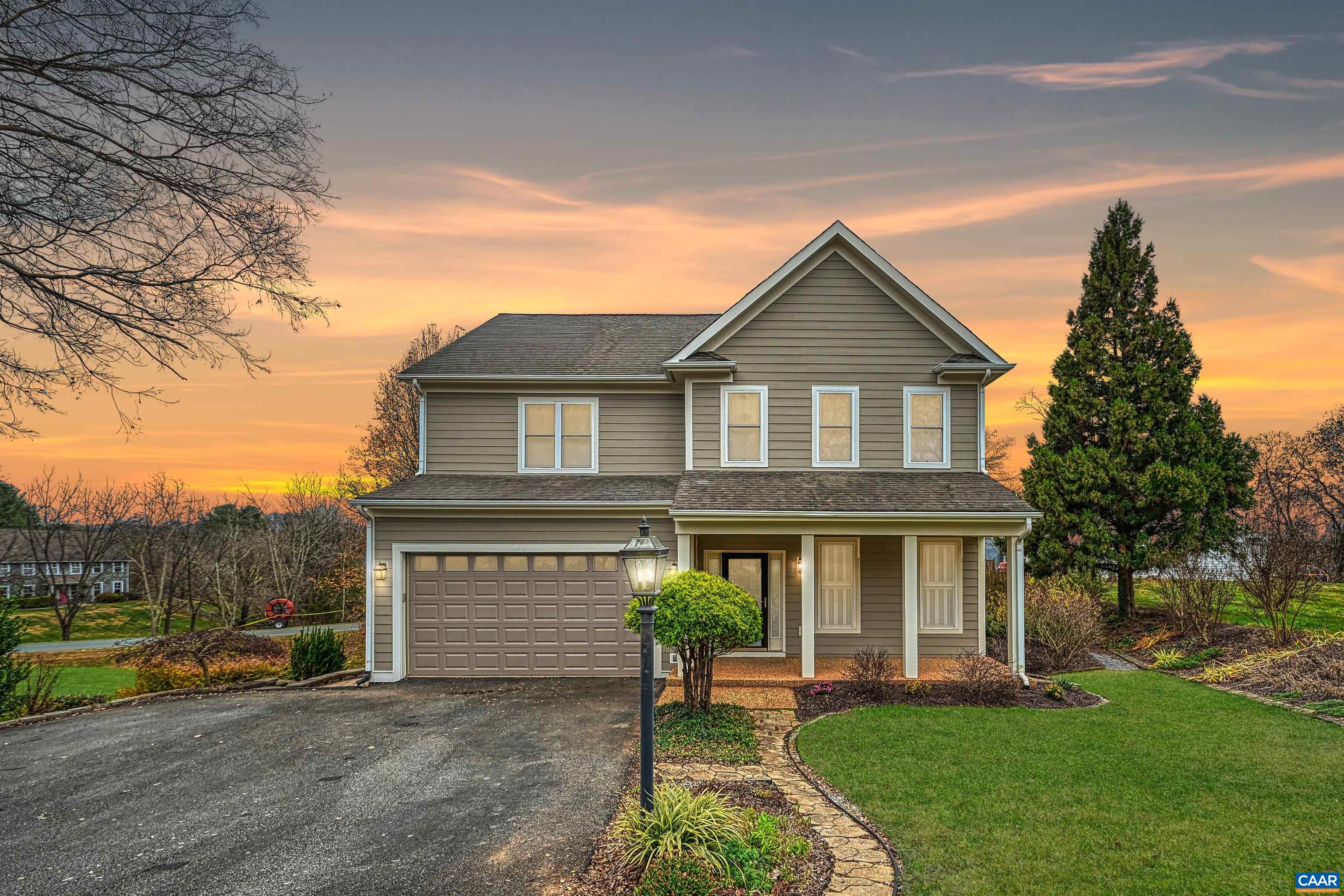 This custom-built, 5-bedroom luxury residence in Crozet is perfectly situated minutes from the interstate, dining, shops, wineries, and breweries, plus the convenience of being on the bus route. The home features a stunning main level with 9.5’ ceilings, hardwood floors, a powder room, dining room, butler's pantry, & a gourmet kitchen equipped with 2 stoves & an island, flowing into a spacious den with gas logs and built-in cabinets. The living area leads to a screened porch & deck. The second floor hosts a laundry room with a sink, a full bath, & three bedrooms, including a spectacular primary suite with a coffered ceiling, walk-in closet, a private bath. A versatile third-floor multipurpose room with a half bath offers beautiful mountain views. Adding significant value is the fully equipped basement apartment with 9’ ceilings, a separate entrance, featuring a flex room, full bath, bedroom, laundry, a kitchenette with a dining area, & a den with gas logs & a wet bar that leads directly to a patio. The property is completed by beautifully landscaped & hardscaped grounds, a covered front porch, an attached garage, a secluded sitting area, & a tool shed with electricity. This unique property is ready to be yours!
