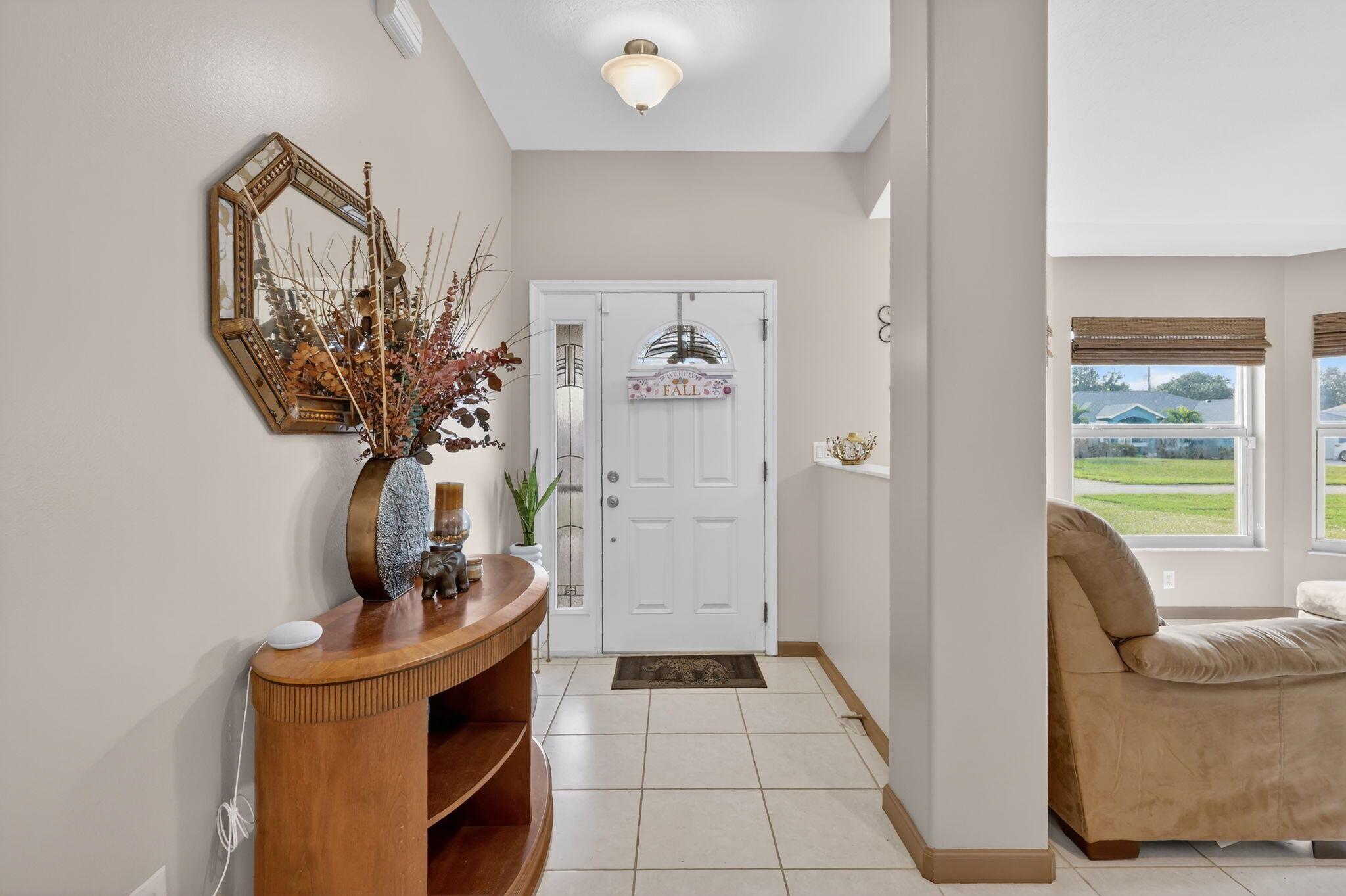 Photo 2 of home located at 557 SW Halkell Avenue, Port St Lucie FL