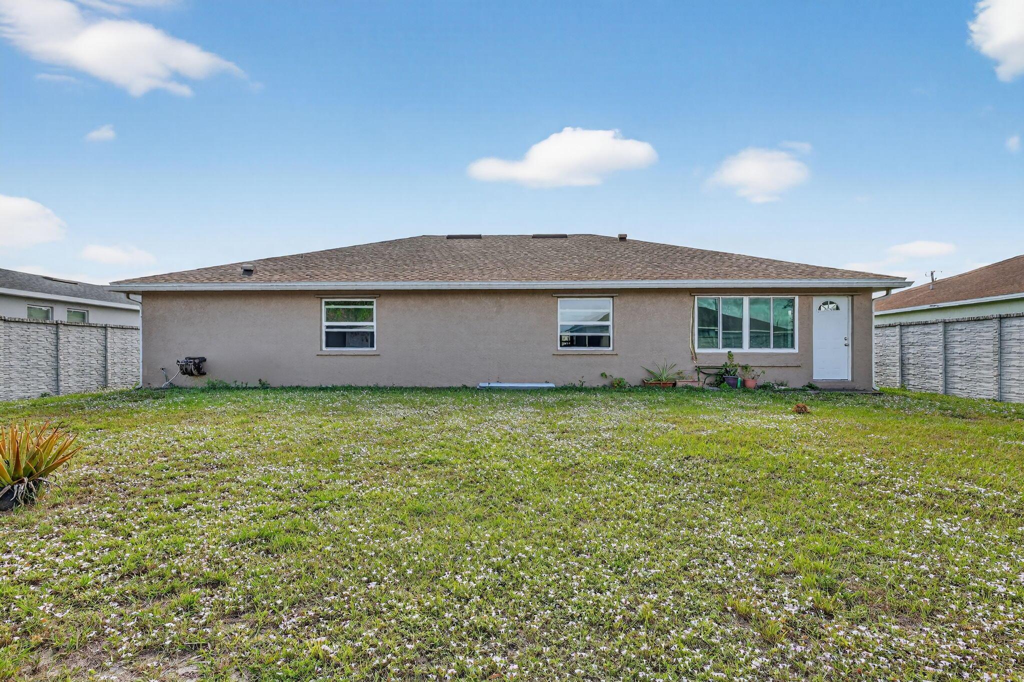 Photo 30 of home located at 557 SW Halkell Avenue, Port St Lucie FL