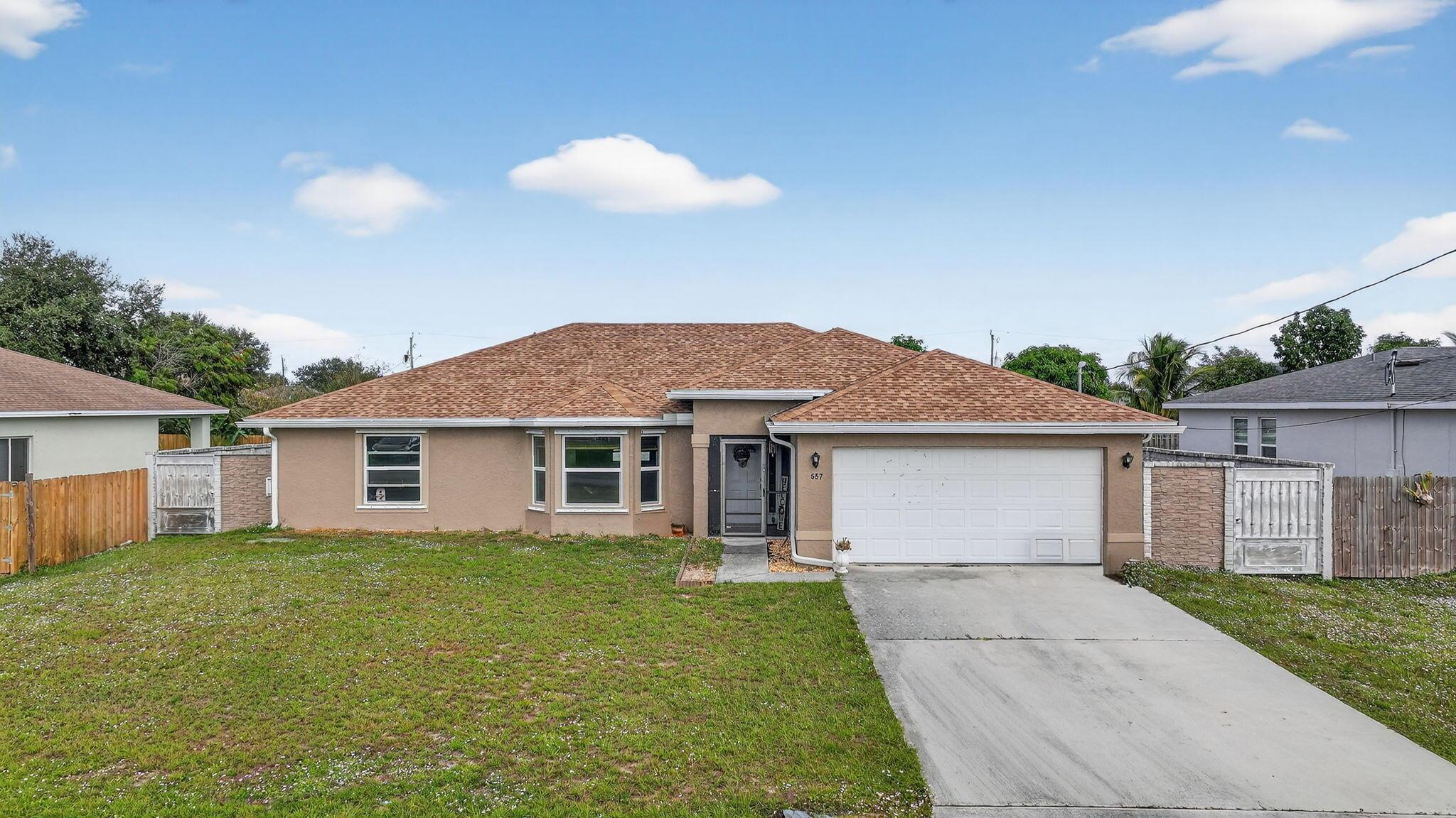 Photo 32 of home located at 557 SW Halkell Avenue, Port St Lucie FL