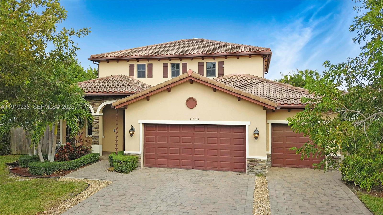 Discover refined living in this stunning 5-bedroom, 3.5-bath Next Gen® home, perfectly situated on a premium corner lot in the exclusive Mendocino at the Vineyards. Designed for comfort, versatility and elegance, this exceptional property features a spacious main residence with 3 bedrooms and 2.5 baths, complemented by a fully private Next Gen® in-law suite complete with 2 bedrooms, 1 full bath, a kitchenette, its own washer and dryer, separate entrance, and a private 1-car garage—ideal for guests or in-laws.The home’s open-concept layout showcases bright, modern living spaces, while the screened-in patio with beautiful pavers provides a perfect setting for outdoor dining and effortless entertaining.Residents enjoy access to resort-style amenities, including an elegant clubhouse, sparkling pool, splash park, children’s playground, and state-of-the-art fitness center!Ideally located near the Florida Turnpike, Baptist Hospital, Homestead Air Reserve Base, and just a short drive to the Florida Keys, this residence offers convenience, lifestyle, and luxury in one unmatched package.A true must-see