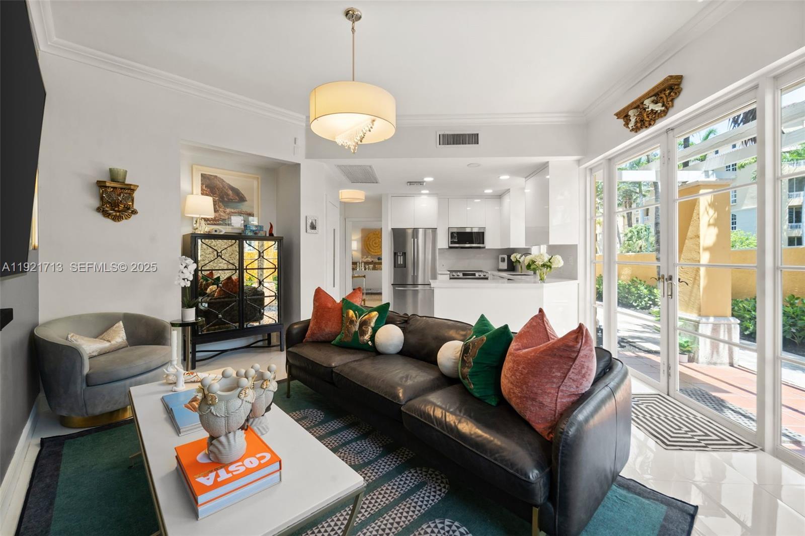 Welcome to this stunning, fully remodeled townhome located in the highly sought-after community of Aventura Bay. This spacious 3-bedroom, 2.5-bath home offers a perfect blend of luxury and comfort. The first floor features a custom kitchen with a large peninsula, top-of-the-line appliances, large pantry, and a stylish half bath. The open living, dining, and family rooms flow seamlessly into a private backyard complete with a lush wall garden and built-in heated spa. Upstairs, you'll find an oversized primary suite with a walk-in closet, Juliet balconies, dual sinks, a separate Jacuzzi tub and shower. Additional highlights include two nice sized bedrooms that share a Jack & Jill bathroom. Enjoy the amenities of this gated community with a pool, gym, the best schools.