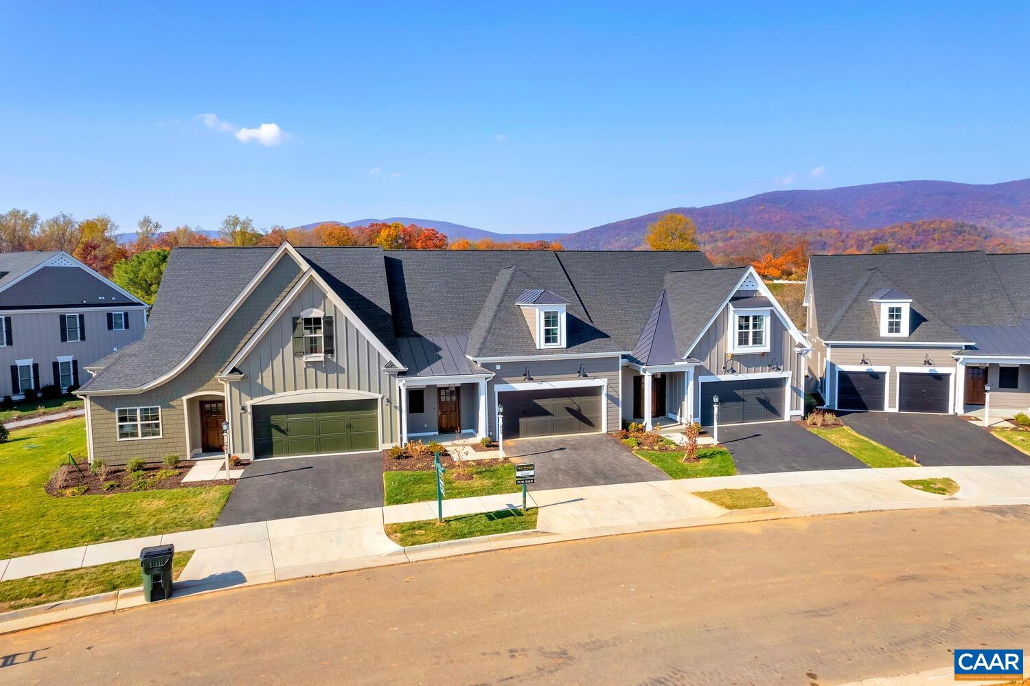 February Completion! Still time to make your final design selections! This end-unit Afton Villa has everything you need for easy, main-level living. The open layout features a bright and spacious Great Room, a private owner’s suite, and a welcoming Kitchen and Dining area—perfect for everyday life and entertaining. There’s also a handy Pocket Study and a Screened Porch that backs to trees, giving you peaceful views and extra privacy.    Upstairs, you’ll find two more bedrooms, a full bath, and a cozy loft space—great for guests, hobbies, or just hanging out. The walkout basement can be finished to add even more spaces such as: an expansive Rec Room, a fourth bedroom, and another full bath. Plenty of space for everyone to spread out and feel at home!  Enjoy our thoughtfully included features, 2x6 exterior walls, custom Mahogany front doors and so much more. (Photos of similar home)