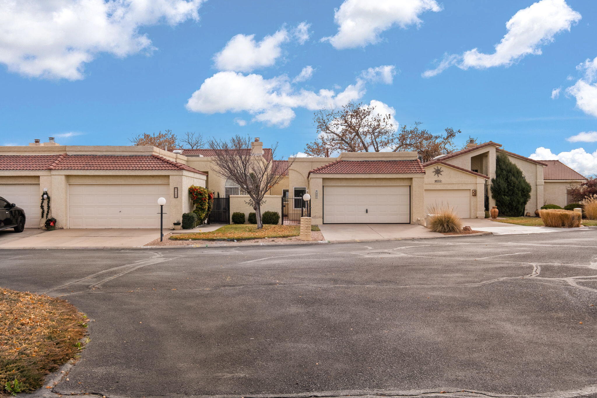Discover comfort and convenience in this charming 3-bedroom, 2-bath townhouse located in The Islands, a desirable 55+ gated community in Rio Rancho. Enjoy stunning Sandia Mountain views from the expansive covered patio, perfect for relaxing or entertaining. A welcoming private courtyard leads into a spacious family room featuring a cozy gas fireplace. The open kitchen and dining area offer raised-panel oak cabinets, stainless steel appliances, and a convenient wet bar, creating an ideal space for everyday living and hosting guests. The large primary suite includes a generous walk-in closet and a full bath for added comfort. Residents enjoy easy access to the community park and tranquil waterfall, adding to the peaceful ambiance of this sought-after neighborhood.Priced to Sell!!!