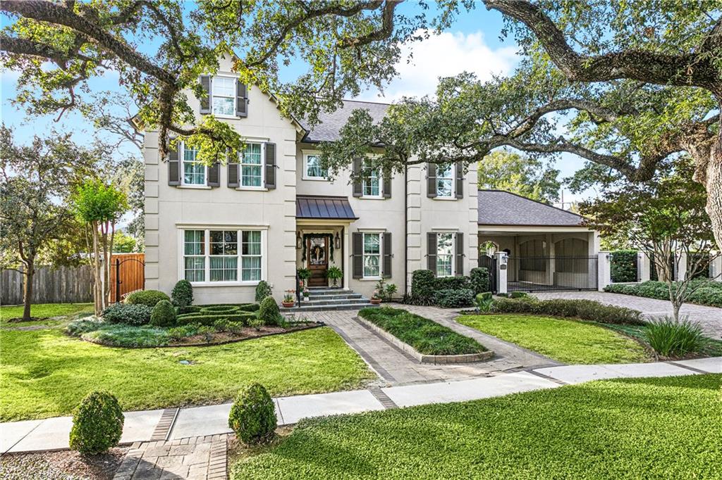 Experience elevated living at 110 Vincent Ave, a custom-built 2012 masterpiece set on a rare 15,080 sq ft double lot in one of Metairie’s most sought-after neighborhoods. Positioned in Flood Zone X, this home offers added peace of mind. Behind the gated two-car carport, the residence reveals exceptional craftsmanship, highlighted by former salvaged railroad wood floors and impressive 10' ceilings on both levels. The first floor offers a refined open layout with a spacious den, sunroom, and two sliding glass doors leading to an inviting covered patio. The kitchen—designed for entertaining—features quartz countertops, stainless steel appliances, dual ovens, and a wine cooler, creating a seamless space for hosting. The first-floor primary suite is a private retreat featuring dual bathrooms connected by a stunning glass shower. A convenient half bath opens to the den, complementing the thoughtful main-level design. Upstairs, discover a private office, three additional bedrooms, and four full bathrooms, along with a dedicated entertainment room equipped with five automatic recliners and flexible enough to function as an additional bedroom. The expansive grounds offer a true resort-style experience: a pool with a fully outfitted outdoor cabana featuring stainless steel appliances, a gated half-court basketball court, and a separate back house complete with a living room, bathroom, attached garage, and attic. An above-ground hot tub and a whole-house generator further enhance daily comfort and convenience. A rare combination of scale, amenities, and luxury—crafted for exceptional living.