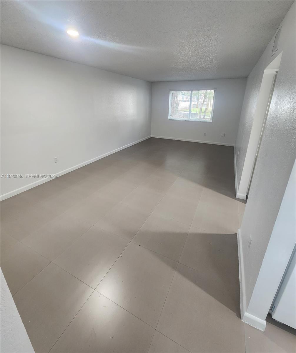 The listed price already reflects a rent credit equal to one month free, prorated over a 12-month lease. The original rent is $1,825, but the displayed price includes the promotional discount. Spacious and well-maintained 1-bedroom, 1-bathroom apartment in a gated community. Rent includes water and high-speed Internet/Wi-Fi. The unit offers 2 unassigned parking permits, access to a community pool, and on-site laundry facilities. Conveniently located near Turnpike Exits 12 and 13. Fast approval process.