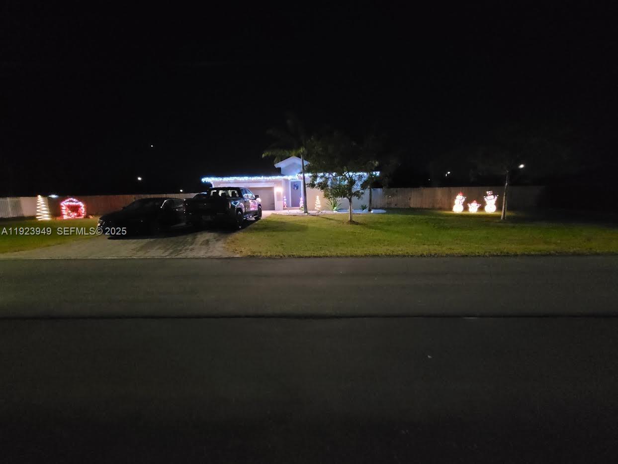 Absolutely beautiful estate home located near the Redlands, featuring a spacious 15x30 pool and new hurricane-impact windows. Situated on an oversized 21,435 sq. ft. lot, the property offers a fully fenced backyard with room for two RVs and a variety of fruit trees, including mango, mamey, papaya, banana, and avocado.Inside, the home boasts a split floor plan with a large master bedroom and walk-in closet, a dedicated laundry room, a modern kitchen with quartz countertops, and tile flooring throughout. Additional features include a double garage—and best of all, no HOA.