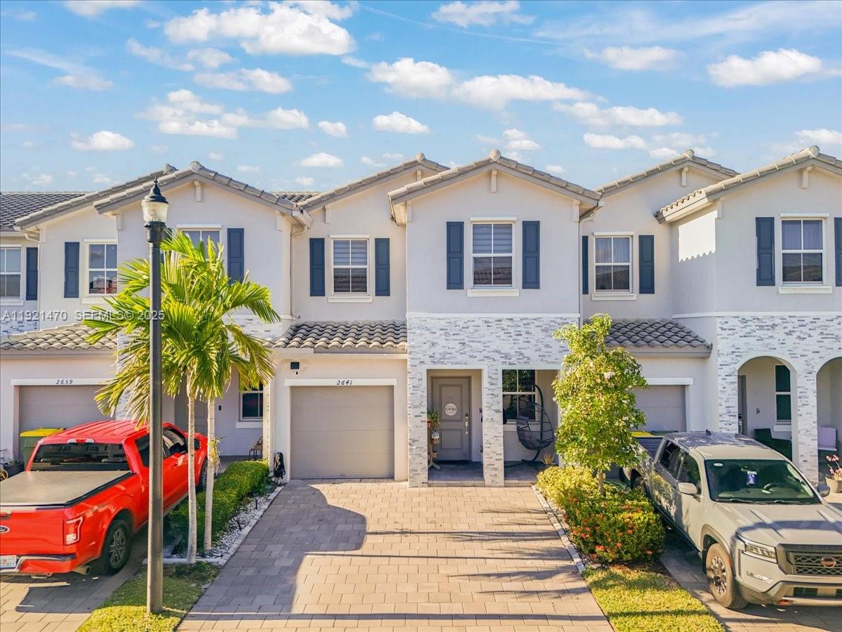 Beautiful 2021 townhome in the desirable Riviera community! This spacious 4-bedroom, 2.5-bath home offers over 1,800 sq. ft. of modern living with quartz countertops, stainless steel appliances, and a one-car garage. Enjoy a covered patio with a pergola, ideal for entertaining or family gatherings. The community features resort-style amenities including a clubhouse, pool, and gym. Located in Homestead, just minutes from the Florida Turnpike, local shopping, dining, and with easy access to the Florida Keys.