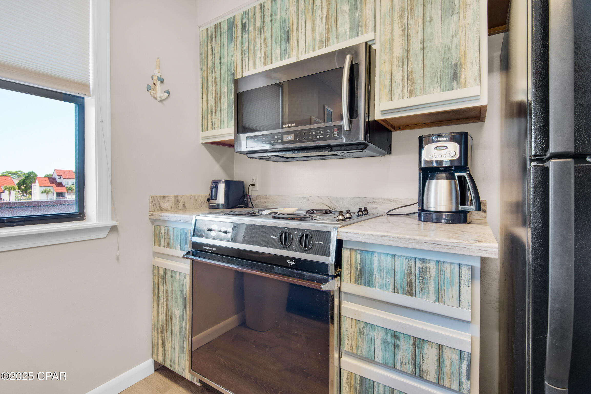 Image 13 For 8730 Thomas Drive 1211c