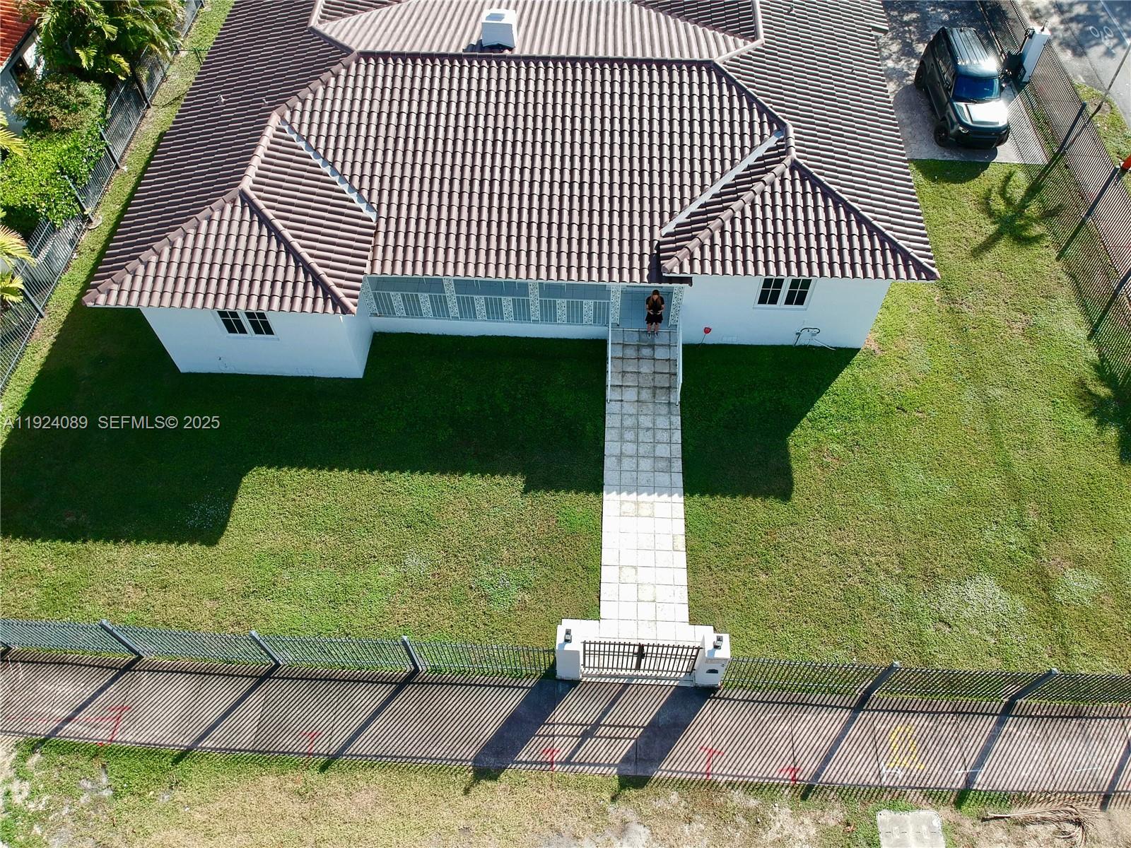 The Perfect single family home t in the center of Coral Gables, just a short distance from St. Theresa Church & School and the Biltmore Hotel & Golf Course.  This 2,353-square-foot has four-bedroom, three-bathroom home with one car garage is full of natural light and open spaces.    Electric gate for parking area.  With a front door facing Sevilla and a garage entrance off of 57th Avenue, the house is situated in the middle of a very sizable 12,725 square foot fenced-in lot.   There is ample room in the backyard and sides to get creative. Property has a brand new roof, updated electrical, new impact windows and doors.  Don't pass up the chance to make this dream home yours. Please call listing agent for showings 24 hours notice please.