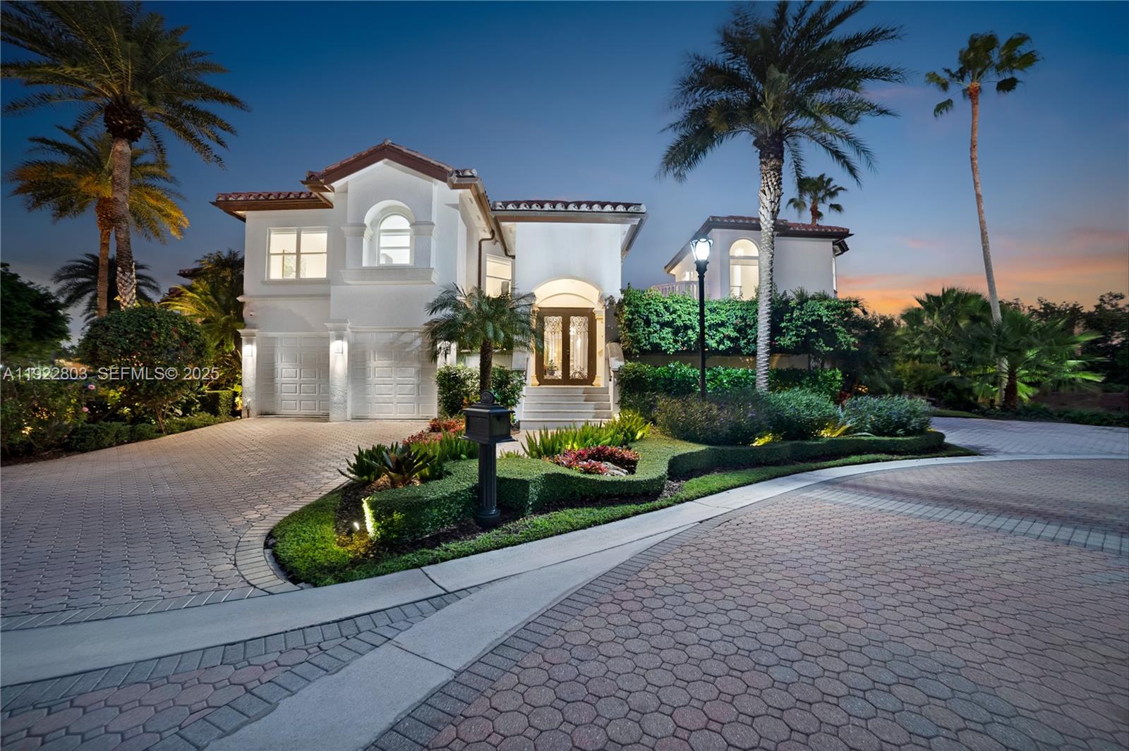 Live the ultimate country club lifestyle in Coral Gables within a prestigious, guard-gated community with 24/7 security. This beautifully updated estate offers refined design, everyday comfort, and effortless indoor-outdoor living, set alongside a championship 18-hole golf course and moments from a deep-water marina. Enjoy a premier location just minutes from downtown Coral Gables, Coconut Grove, and Miami International Airport, perfectly positioned to access Miami’s best dining, culture, and nightlife while preserving total privacy.The main residence features 4 generously sized en-suite bedrooms, including an elevated second-floor primary suite with a private balcony and serene golf-course and courtyard views. A separate guest house adds a 5th bedroom, full bath, kitchen, living room, and its own balcony, creating the ideal space for visitors or extended stays. The resort-style courtyard and sparkling pool connect both homes, enhanced by peaceful bay breezes. A standout outdoor summer kitchen, wrapped in bold blue tile with a built-in bar and grill, completes the backyard retreat. Fully furnished, rare end lot, unmatched tranquility.