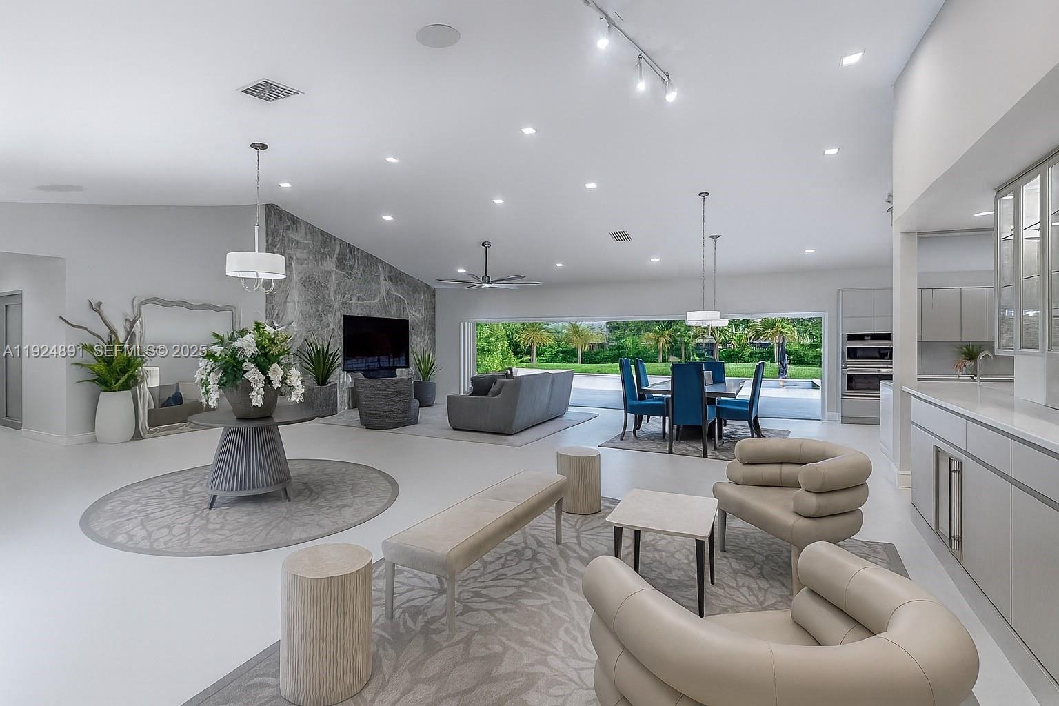 Completely remodeled lakefront estate in the prestigious Fieldbrook Estates—one of only 54 homes in this private, gated, and secured community. Nestled in the heart of Boca Raton, Fieldbrook Estates is a hidden gem known for its oversized lots, low HOA, and unmatched privacy.This elegantly updated residence offers 5 bedrooms and 4.5 bathrooms, featuring a modern open floor plan, a brand-new chef’s kitchen, new flooring, spa-inspired bathrooms, and smart lighting and security systems throughout. 5th bedroom is currently being used as an office and has plenty of space to build a closet. A beautifully finished marble-paved driveway and patio elevate the property’s curb appeal.Step outside to your private backyard oasis overlooking the lake—perfect for serene everyday living or unforgettable entertaining. Set on one full acre, this home provides the rare blend of luxury, space, and tranquility.Additional upgrades include two new AC units and a new roof installed less than one year ago, offering style, comfort, and peace of mind.