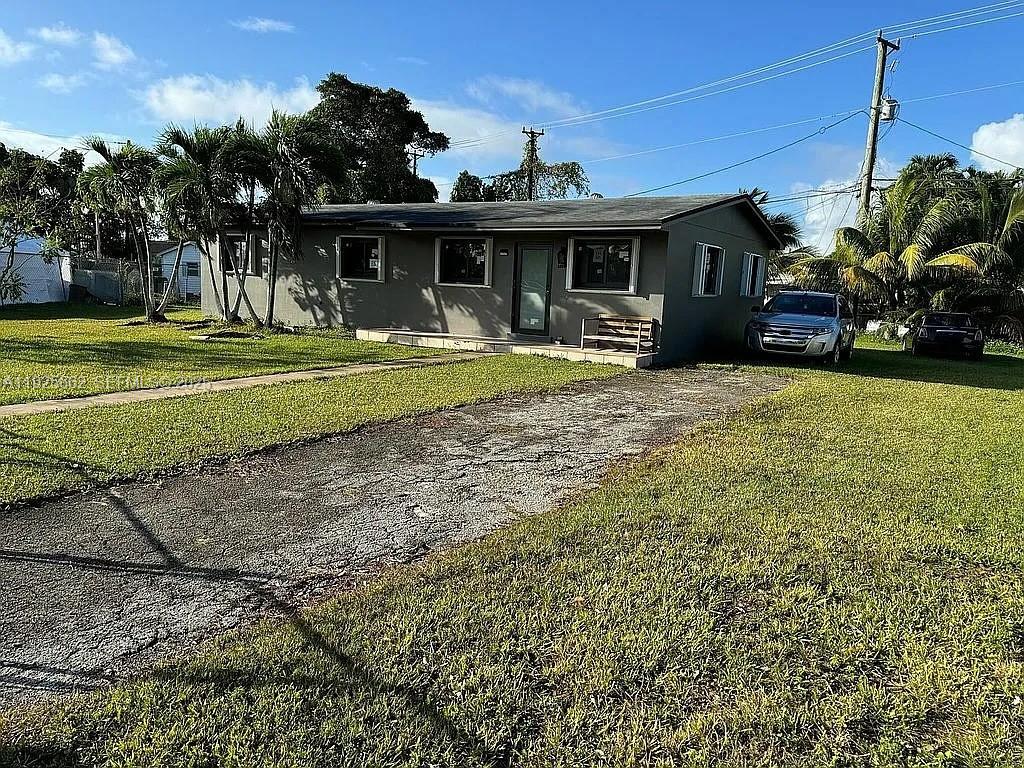 GREAT OPPORTUNITY for investment or a family home! This 3BED/2BATH property includes a separate 1BED/1BATH unit, perfect for rental income. Nice tiled home on a HUGE 14,000 SQ FT LOT in a quiet neighborhood. Close to the Turnpike and US-1. Don’t miss this Homestead gem hitting the market!