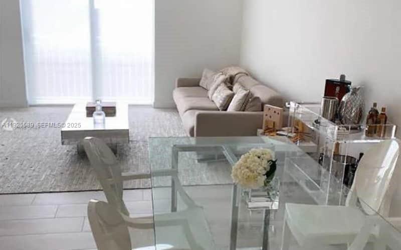 Amazing opportunity to live in Douglas Grand building in the heart of Coral Gables. Completely updated, professionally decorated unit with high-end finishes. Custom made closets, granite countertops, tile floors, washer/dryer inside unit in a secure building featuring, concierge, pool, and exercise room. Just minutes from Brickell, Coconut Grove, and Downtown Miami giving you access to the best Miami has to offer. Included is cable/internet and water, swimming pool, and exercise room. Also, there is a Publix on the ground floor of the building. If you'd like the unit un-furnished, can be accommodated as well.