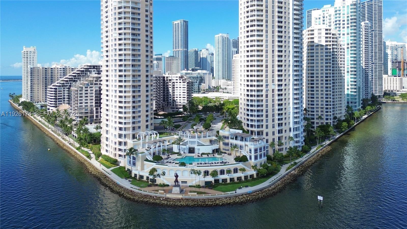 Experience true Miami living in this stunning 2-bedroom, 2-bathroom waterfront condo located on the exclusive Brickell Key. This residence is one of only three units in the entire building featuring two oversized terraces, offering exceptional privacy and breathtaking water views across 1,763 SQFT of seamless indoor–outdoor living.Inside, you'll find a thoughtfully designed layout with an expansive walk-in closet and a sleek modern kitchen outfitted with brand-new stainless steel appliances, including a refrigerator, oven, and microwave. For added convenience, your assigned parking space is located on the same floor as the unit. Enjoy resort-style amenities, including a waterfront pool, a two-story fitness center overlooking the bay, sauna, BBQ area, tennis court, EV charging stations, and 24-hour concierge service. The community is gated and offers covered access to the island’s scenic boardwalk, connecting you to shops, dining, and more.This rare Brickell Key home offers exclusivity, luxury, and the best of Miami’s waterfront lifestyle.