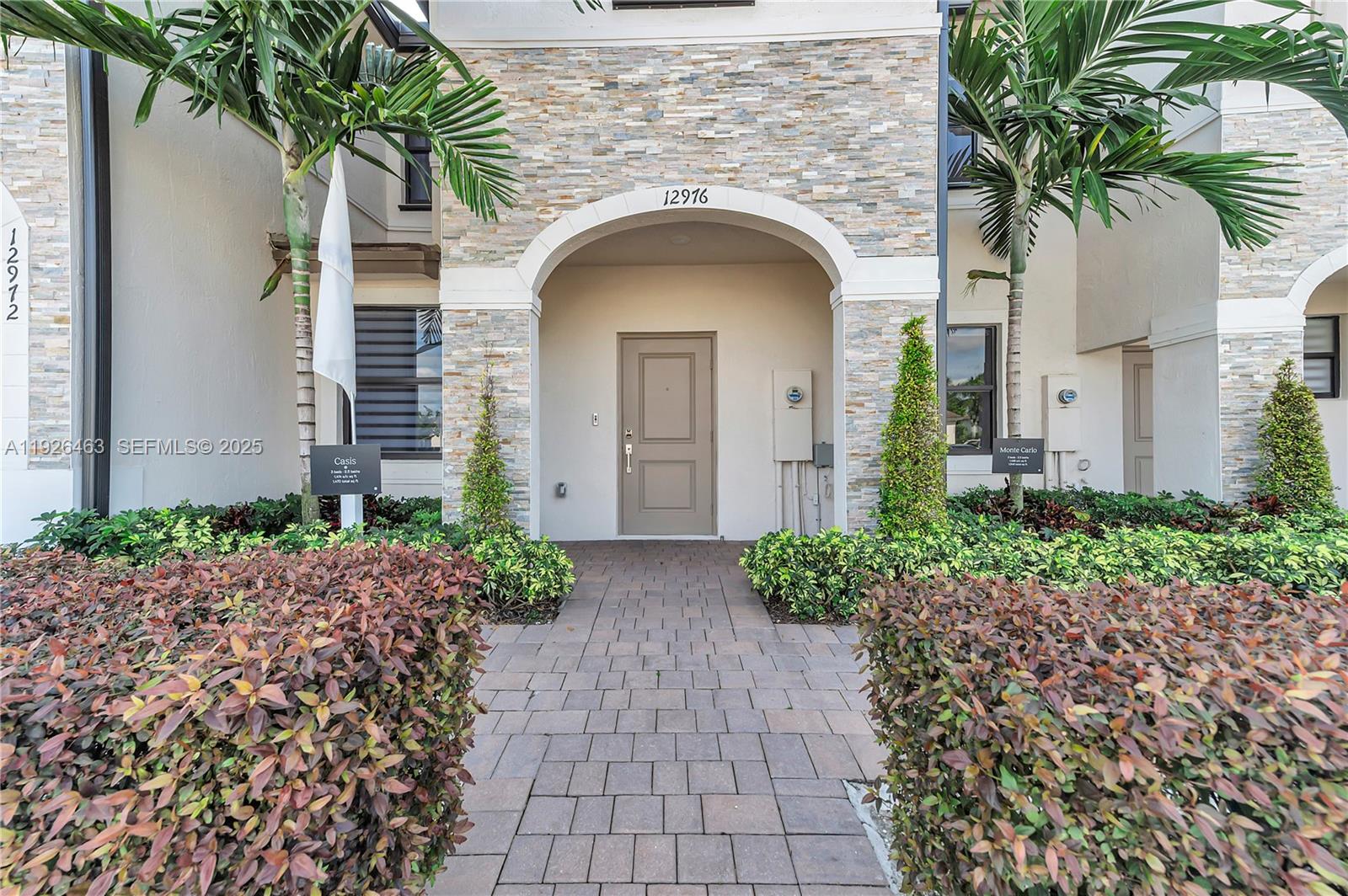 South Florida living at its best! This former builder model has never been lived in and is perfect as a starter home, second home, or investment. The 3BR/2.5BA layout offers modern comfort with a sleek kitchen featuring stainless steel appliances, a fenced rear yard, and a spacious primary bath with walk-in shower. Furniture not included but negotiable. This home also provides Impact Glass windows and doors. Enjoy affordable HOA fees and great amenities including a clubhouse, fitness center, pool, and tot lot. Square footage approximate.