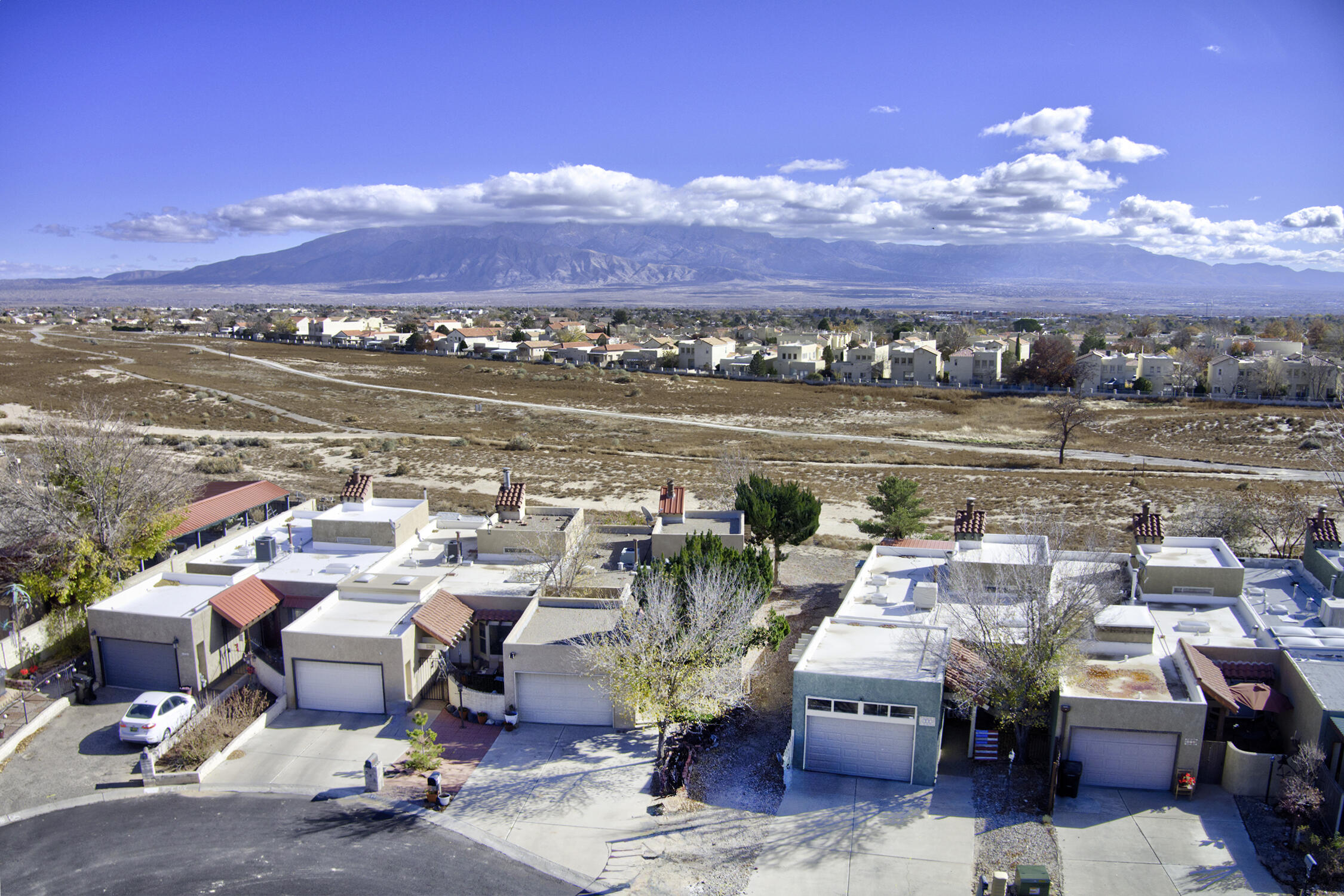 Discover the potential in this Rio Rancho gem!This 2-bedroom, 2-bath home offers stunning mountain views and sits in a quiet, established neighborhood. With over 1300 sq. ft. of living space and a 1-car garage, this property is perfect for anyone looking to customize a home to their taste.Inside, you'll find an older, well-loved interior ready for updates--an ideal opportunity for investors, DIY buyers, or anyone wanting to add instant value. The spacious lot offers room to create your dream outdoor space while enjoying beautiful New Mexico sunsets over the mountains.Whether you're looking for your next project or a home with great potential in a desirable location, this one is worth a look!