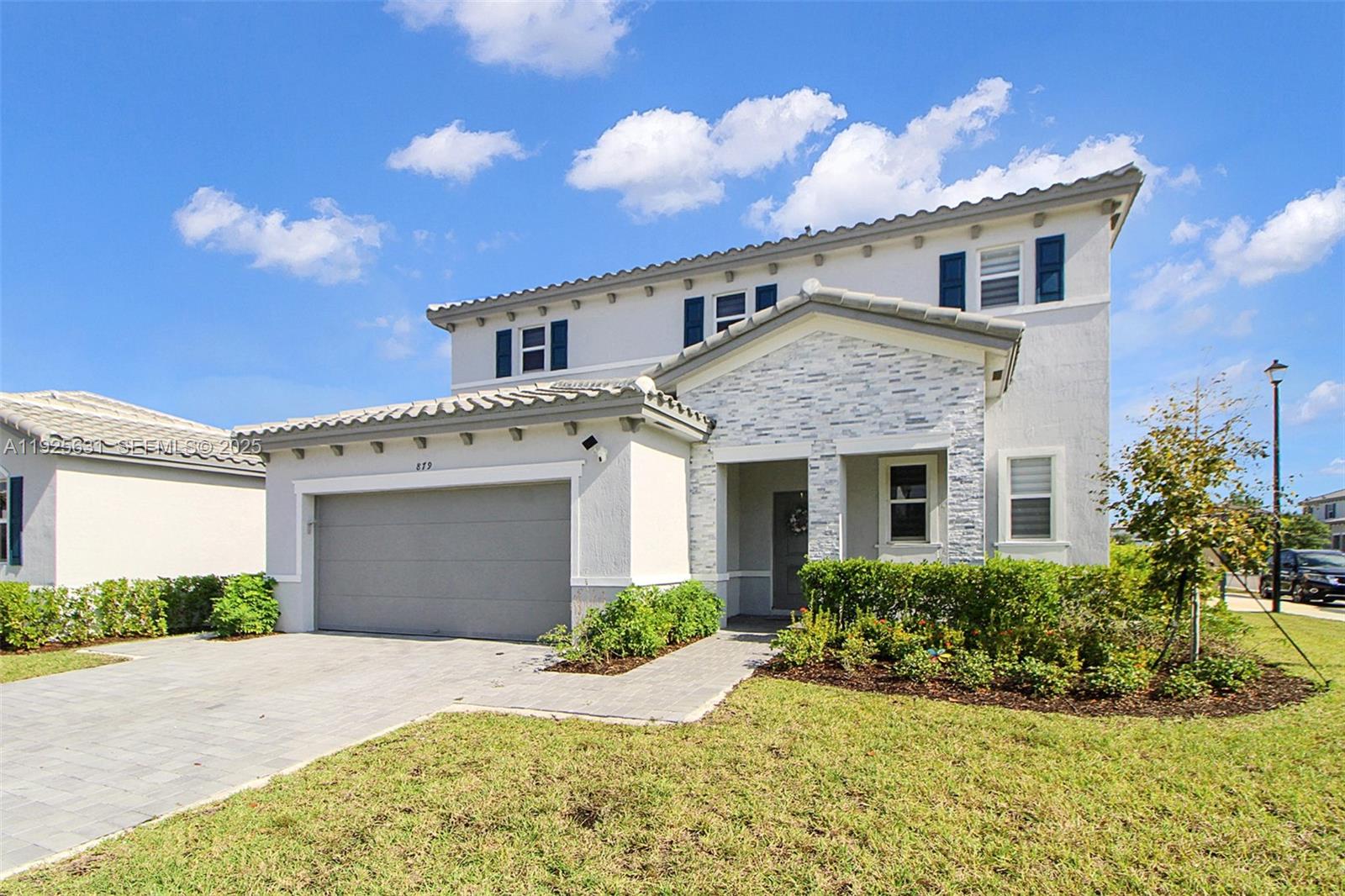 Corner lot charm meets turnkey convenience. This home places you near the Turnpike, with quick access to shopping and dining—plus a thoughtfully added insulated terrace, complete with exterior lighting, fans, and a big patio for hosting friends and family. Inside, enjoy a dedicated two-car garage and a complete in-law suite attached to the main house, featuring its own private entrance for ultimate privacy. Impact windows and zebra-style shades bring an elevated, low-maintenance aesthetic. Ideal for multigenerational living or additional rental income—book a showing today!