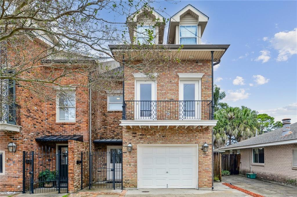 Discover exceptional space and versatility in this three-story, all-brick townhome located in Old Metairie. Offering 3 bedrooms, 3.5 bathrooms and multiple flex-use rooms, this residence provides an outstanding opportunity for those seeking convenience, comfort, and room to grow.The first floor features a welcoming dining room and a large open kitchen/living area centered around a charming fireplace—perfect for everyday living. An attached one-car garage adds convenience, while the expansive rear yard offers endless possibilities for outdoor entertaining, gardening, or future improvements.On the second floor, the spacious primary suite includes a private bathroom with an updated walk-in shower designed to offer a spa-like experience, featuring a rain showerhead and multiple body sprays. The suite also includes an oversized jetted tub and dual vanity areas. Also on this level is a second bedroom with its own ensuite bathroom and access to a walk-out balcony, ideal for fresh air and relaxation. A generous flex space completes the floor—perfect for a home office, den, or creative workspace.The third floor stands out with a full bathroom, an additional bedroom and a substantial bonus room currently used as a billiards room. Its size easily allows for conversion into one or two extra bedrooms, or a combination of a bedroom and a flex room—offering exceptional adaptability.Situated near Metairie Road, this property provides excellent access to retail, dining, I-10, and the CBD. With so many layout options and plenty of potential to customize, this home is ready for its next owner to make it their own.