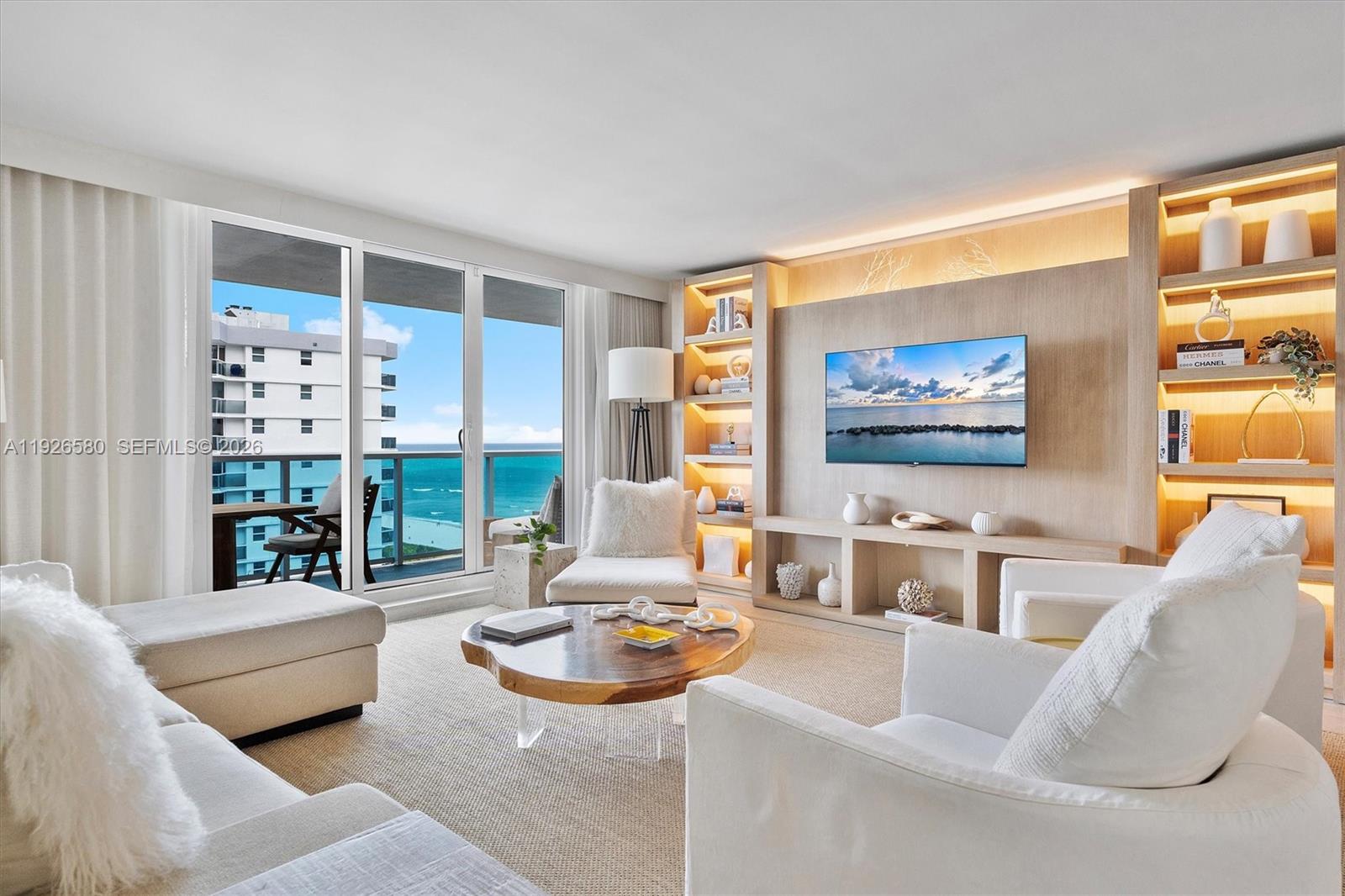 Discover a rare opportunity to own a prestigious 3-bedroom, 3-bathroom residence with den at the iconic 1 Hotel & Homes South Beach, offering sweeping ocean and Intracoastal views.This sophisticated residence blends elevated design with true resort-style living, featuring a private, fully finished balcony and the coveted 1 Hotel designer furniture package—allowing for immediate enjoyment or seamless rental activation.Owners enjoy exclusive access to a private, full-service residential lobby and concierge, along with world-class amenities including four oceanfront pools, acclaimed dining venues and bars, a 14,000-square-foot fitness center, Bamford Wellness Spa, and SoulCycle.Partnering with Five Star Luxury Travel provides exceptional short-term rental capabilities and income potential, making this residence as compelling an investment as it is a lifestyle.More than a home, this is refined beachfront living with the flexibility, service, and prestige only 1 Hotel & Homes can offer—perfect as a primary residence, second home, or income-producing asset in one of Miami Beach’s most sought-after luxury destinations.