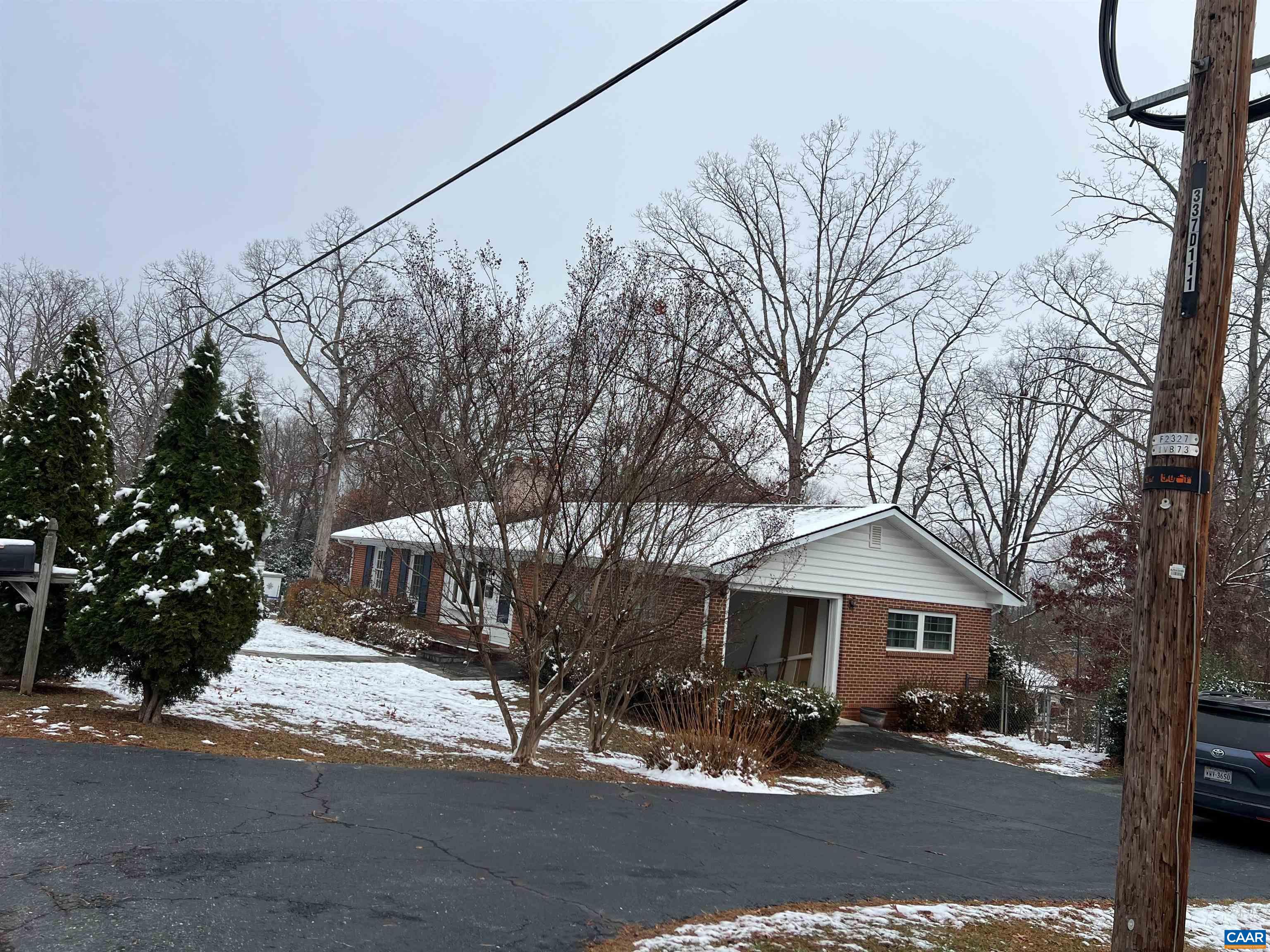 Quality solid brick ranch w/ lower level & multi use  as multi generational family needs, income producer lower level(no HOA) or one level living and room for family & company with extensive  renovation w/ incredible upgrades  near everything.   Walk to 3 public schools, near Stonefield, downtown, UVA and enjoy huge fenced private rear yard for pets & children.   Inside enjoy huge office or family rm w/ separate entrance w/granite, porcelain tile &  no carpet only hardwood floors, ceramic, and porcelain tile, gourmet kitchen with fabulous cabinets, granite counters, stainless appliances porcelain floors kitchen. Large living  and dining room with hardwood floors, Anderson windows.  Finished basement with great room &  gorgeous large walk in shower and bath, and 2nd fireplace with solid wood paneling .  A must see immaculate  home and renovation ready to enjoy & quick occupancy if needed.Professional pics SOON.SNOW ICE CANCELS OPEN HOUSE