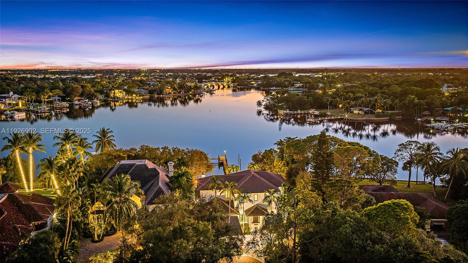 Nestled on nearly one acre of pristine riverfront, this exceptional estate offers breathtaking wide-water views facing south. The main residence features 4 spacious bedrooms, designed to capture natural light and the serene beauty of the river. A charming two-story guest house provides ultimate flexibility, with 2 separate living areas each with a private bedroom, and a full bath—perfect for extended family, visitors, or a private studio. Outdoor living is elevated with a stunning loggia, complete with a fireplace and elegant stone floors, creating the ideal setting for entertaining or quiet evenings overlooking the majestic river. This rare offering combines timeless architecture with unmatched views, delivering a lifestyle of tranquility and sophistication along the water's edge.