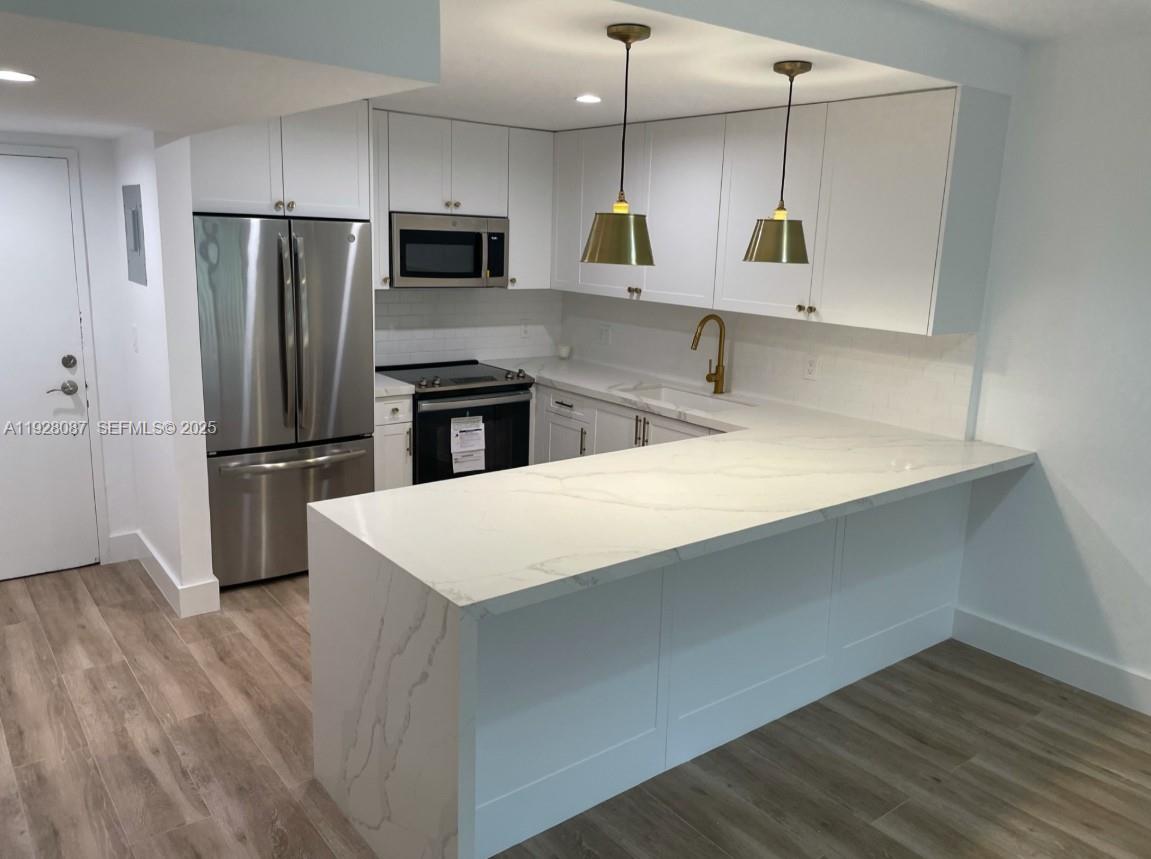 Welcome to 100 Edgewater Drive! One of the best locations in Miami! This excellent condo sits right on the water and is walkable to Coconut Grove and Coral Gables. Enjoy the safety, convenience and tropical views of this great area of town. Unit is a completely renovated one bedroom/one bathroom directly on the first level overlooking the relaxing courtyard of this private and welcoming condo. There are also many boat slips on the property that come available occasionally. The unit comes with 1 parking space and there is additional guest parking. Enjoy the amazing pool area that is on the water! Security too! Please call/text for showing instructions!