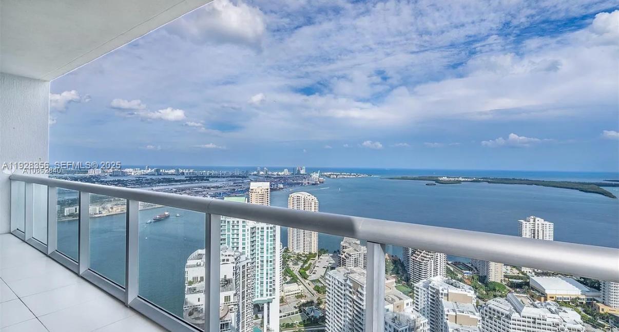 Welcome to Unit 5707, an ultra-high-floor residence offering some of the most indestructible, permanently unobstructed views in all of Miami. Perched on the 57th floor, this home showcases floor-to-ceiling impact glass that frames sweeping views of Biscayne Bay, the ocean, and the Brickell skyline—day and night.The interior features a bright, open layout with a spacious living area, generous bedroom suite, and a dedicated office/den space perfect for working from home with an inspiring backdrop. Modern finishes, a well-appointed kitchen, and a private terrace elevate the living experience even further.Located within the world-renowned Icon Brickell, residents enjoy one of Miami’s most impressive amenity collections, including:       A massive resort-style pool deck overlooking Biscayne Bay       A full-service spa + fitness center with state-of-the-art equipment      On-site restaurants and café      24/7 concierge, valet, and security     Luxurious resident lounges and relaxation spaces     Access to the Icon Brickell waterfront promenade     High-end hotel services within the complexThis is luxury high-rise living at its finest—unmatched views, premier amenities, and the best location in Brickell. Unit 5707 offers the true Icon Brickell experience.