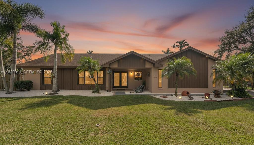 This is NOT your ordinary 3-bedroom home.This elegant single-family home offers an exquisite blend of comfort and style, perfect for those seeking a tranquil retreat with modern conveniences. This expansive floor plan offers 2,291 square feet of living space with a spacious split floor plan and tile flooring throughout.The heart of this home is its inviting living area, seamlessly connected to a well-appointed kitchen equipped with new appliances making it a delightful space for culinary adventures and entertaining guests.The home features a newer roof, impact windows, eave lights, refrigerator/stove 2025, AC, 2023, washer/dryer 2022 and has been freshly painted. Enjoy a spacious screened terrace that opens to a lush backyard adorned with fruit trees. Set on a 17,015-square-foot lot, the property includes a long driveway, covered carport, and a two-car garage. Free from CDD and HOA fees. Come and experience this comfortable residence in unincorporated Miami offering numerous opportunities for multi-generational families or just  want space.