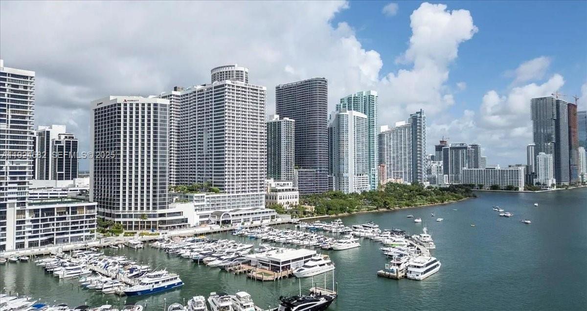 Repriced to sell!!!! Welcome to Aria on the Bay Edgewater in Miami's trendiest neighborhood. Indulge in luxury living and 5 star resort style amenities. 1 + den/2 BATH w/ gorgeous CITY & BAY VIEW. Unit features: Italkraft cabinets, Bosch stainless steel appliances and Brizo faucet.Aria on the bay amenities include gym, yoga studio, private spa and massage treatment area. Also includes, business center with conference room and offices, BBQ with summer kitchen, outdoor fire pit, theater room, pool tables, great room with social areas and high speed internet. Concierge services and valet parking.