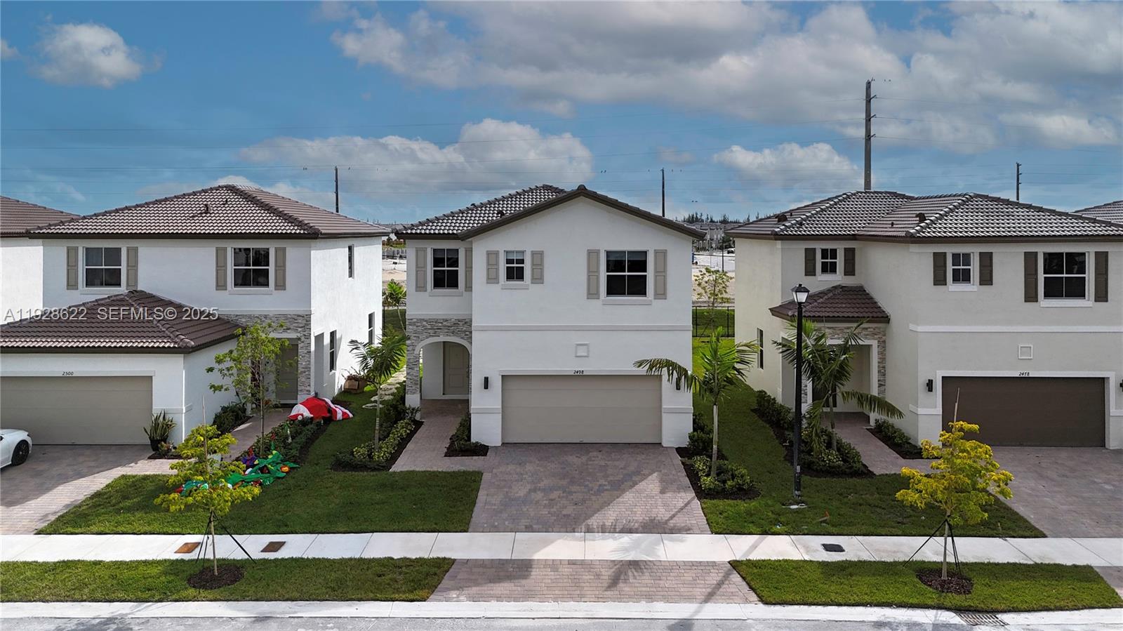 Spectacular Brand-New Single-Family Home in Altamira. Be the first to live in this never-occupied 4-bedroom, 2.5-bathroom home with a 2-car garage. Featuring a spacious open layout filled with natural light, this residence overlooks an oversized fenced backyard complete with a large, paved area and low-maintenance artificial turf—perfect for year-round outdoor enjoyment.  The contemporary kitchen includes stainless steel appliances, plus a washer/dryer and central A/C for your comfort. Move-in ready! Conveniently located near schools, shopping, dining, and major highways. Association approval required.