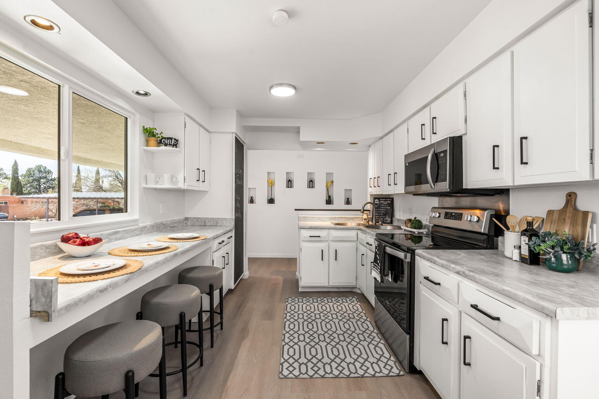 10905 WOODLAND AVENUE NE, ALBUQUERQUE, NM 87112  Photo 7