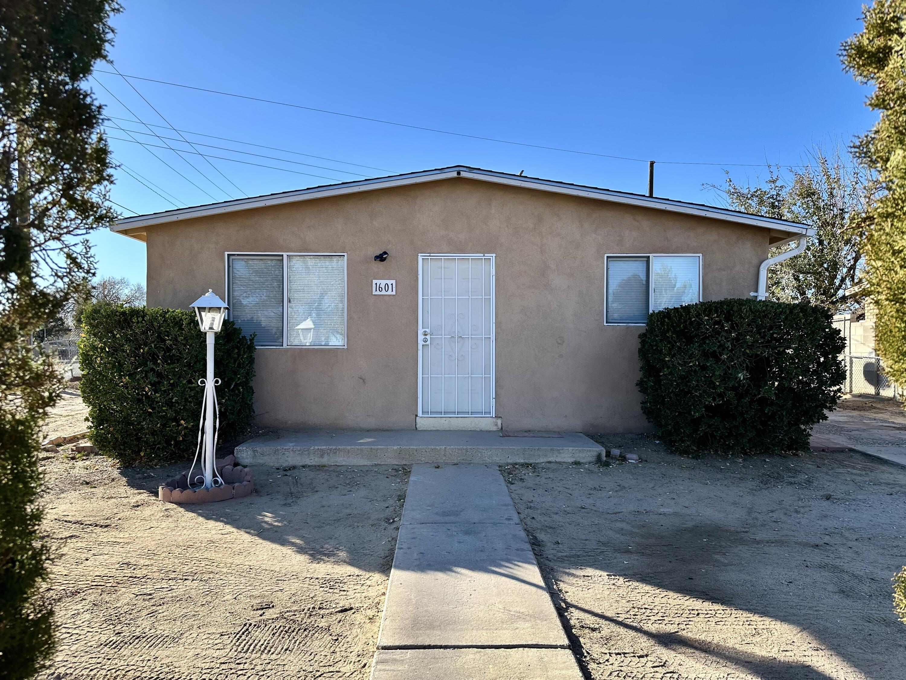 This inviting 3-bedroom, 1-bathroom home sits on a large corner lot and offers the perfect blend of comfort and convenience. Step inside to find new carpet, fresh interior paint, and a bright, welcoming layout that feels like home from the moment you walk through the door. Enjoy year-round comfort with a newer evaporative MasterCool system, and take advantage of backyard access--ideal for extra vehicles, toys, or future projects. The fenced backyard provides privacy and space to relax, garden, or entertain, and includes a storage shed for all your outdoor essentials. Whether you're a first-time buyer or looking to downsize, this well-cared-for home is ready for you! Don't miss this one!