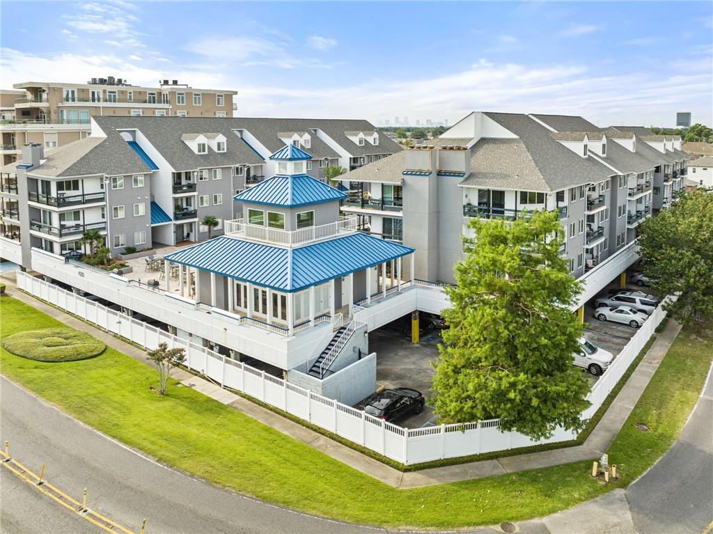 Located in the highly sought-after Pontchartrain Place community, this beautifully maintained 1 bed, 1 bath condo offers resort-style living just steps from the lakefront. Enjoy secured access to both the building and garage, an in-ground pool, relaxing cabana, and a lushly landscaped courtyard. One assigned covered parking space and a private storage locker in the garage are included, with plenty of guest parking available.Inside, the unit is filled with natural light and overlooks the pool and courtyard from every window. A covered balcony provides the perfect spot to unwind. The spacious bedroom includes a large walk-in closet, and the bathroom features a garden tub.Can be negotiated fully furnished, this condo is an ideal turn-key investment or move-in-ready primary residence. Enjoy unbeatable access to popular New Orleans restaurants and the scenic walking, jogging, and biking path along Lake Pontchartrain.