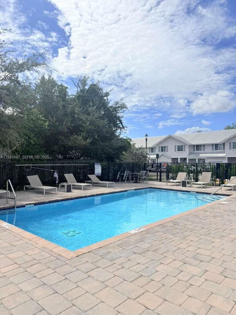 Very spacious townhouse 1 car garage + 2 parking spaces, backyard patio, amenities includes pool area. Very fast HOA approval.