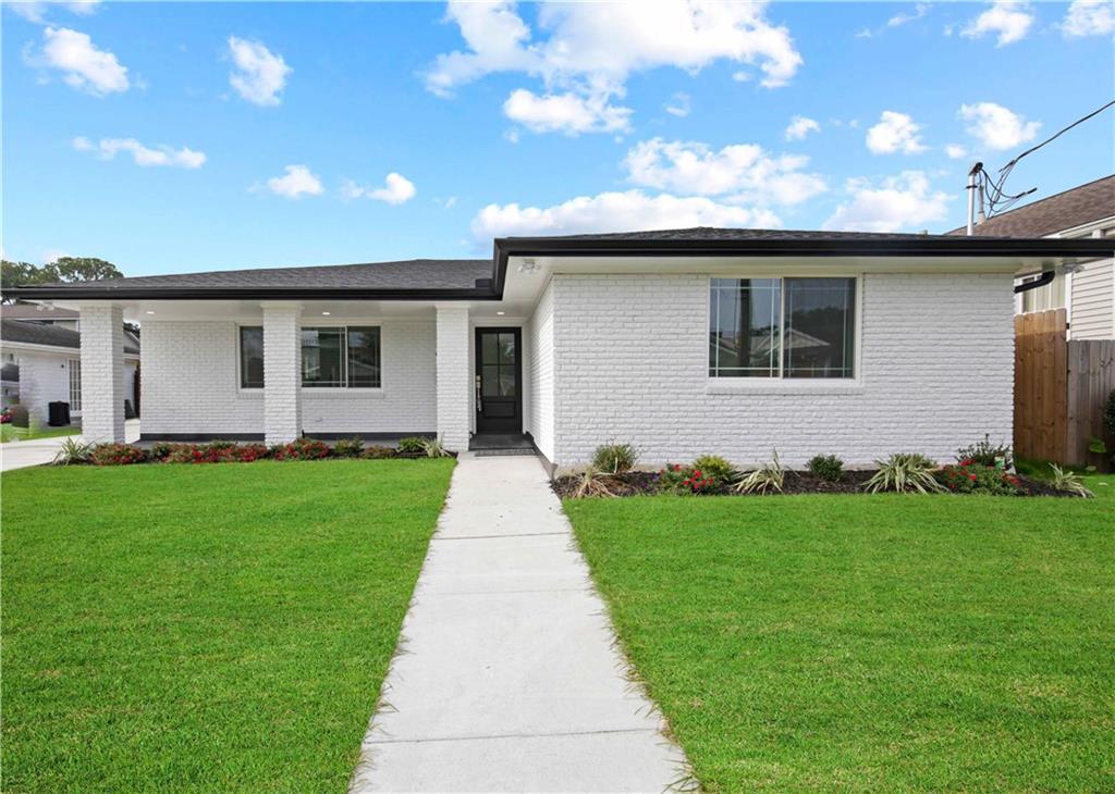 This stunning, move-in-ready home has almost EVERYTHING NEW! Spacious front porch & new stylish double insulated windows, new roof, gutters and a freshly painted exterior delivers striking curb appeal. New concrete driveway leads to carport. The open living area seamlessly accommodates modern living with elegant tile flooring throughout as well as new designer ceiling fans, lighting, upgraded interior & exterior doors, new baseboards & door casings, new HVAC system & ductwork and more! The chef-inspired kitchen with a generous walk in pantry is a true centerpiece featuring a center island with seating & abundant custom cabinetry. Premium SS appliances include microwave, 4 burner gas range with griddle, dishwasher, and sleek Smart refrigerator with an Insta View glass door. Enjoy your private retreat in the spacious primary suite and luxurious bath with high end features. All bedrooms are enhanced with custom closets complete with built-ins offering refined organization. From the soothing color palette to the spacious layout, every detail has been carefully designed to create a spa-like atmosphere. Entertainer’s paradise showcases the expansive 25.8 x 12 covered patio for the perfect setting for hosting guests or enjoying quiet evenings, all while being surrounded by a privacy fence for ultimate seclusion. This space is ready to create unforgettable memories.