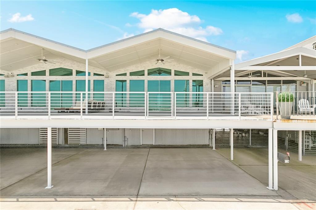 This is not your average boathouse. Most boathouses on breakwater drive are 20 foot wide with 7 ft ceilings at the low point This Boathouse is 25 foot wide with low point of ceiling at 9 feet vaulting to 13 feet. HUGE decks in front and backyards to watch boat parade, sailboats or enjoy the scenery of Lake Pontchartrain. Come fall in love with this exclusive get away on Breakwater Drive.