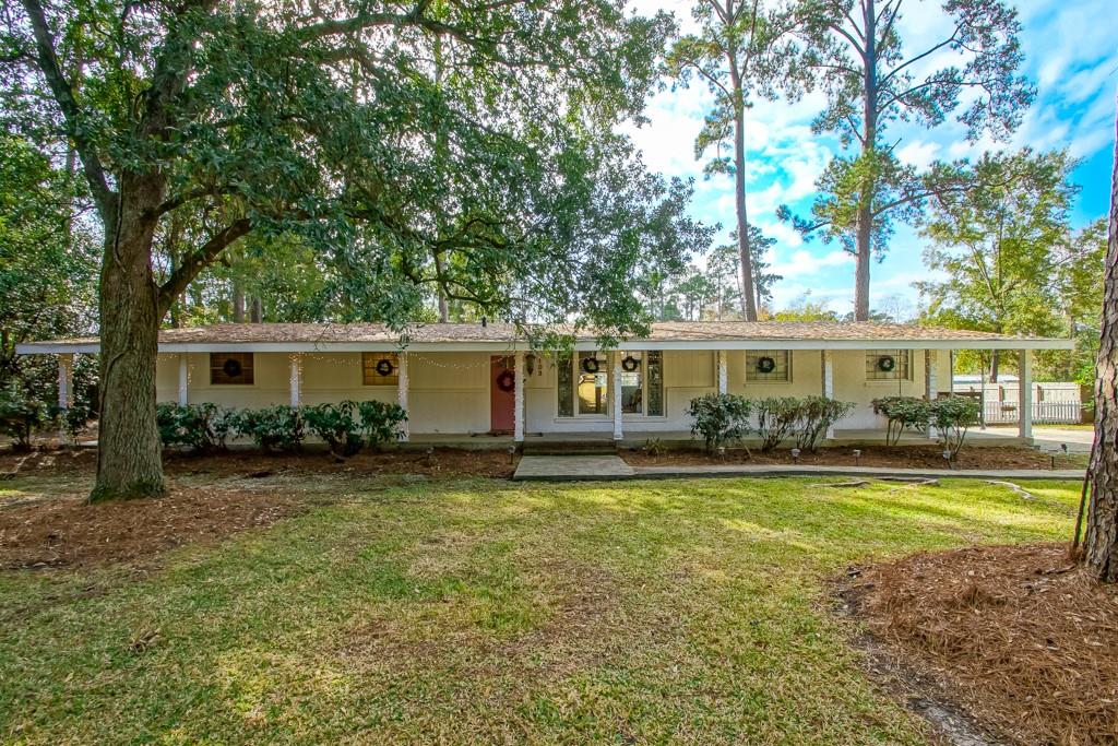 Freshly touched up and ready to call home, this beautifully renovated property is a rare find in a prime location, just minutes from the Causeway and I-12 and zoned for Mandeville schools. The open floorplan and thoughtful updates create an inviting space for everyday living and entertaining.Major improvements include a new roof (2022), HVAC system with all new ductwork (2022), and water heater (2023). The majority of the home features new sheetrock and interior doors (2022–2025), giving the interior a clean, refreshed feel. The kitchen offers stone countertops, stainless steel appliances, updated backsplash, and a large pantry, flowing seamlessly into the main living areas.The spacious primary suite features a huge walk-in closet, while additional highlights include a laundry room with wash tub, large recreation room, and vinyl plank and ceramic tile throughout. All-electric home with gas available.Set on an oversized 150 x 204 lot, this home delivers space, value, and an unbeatable location.