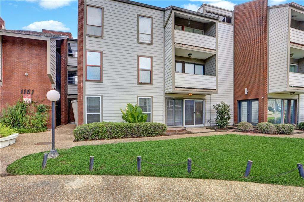 This spacious 1 bedroom, 1 bathroom first-floor unit is conveniently located just steps from the front circular driveway and comes with off street parking. Inside, you’ll find brand new vinyl flooring, fresh paint throughout, and updated door hardware for a modern touch. An electric oven has also been installed since the photos were taken. The condo is filled with natural light and offers plenty of storage with three closets. Situated in a gated community with a swimming pool, this move-in ready home combines comfort, convenience, and security—all in a desirable location for local shopping, dining, and city access.