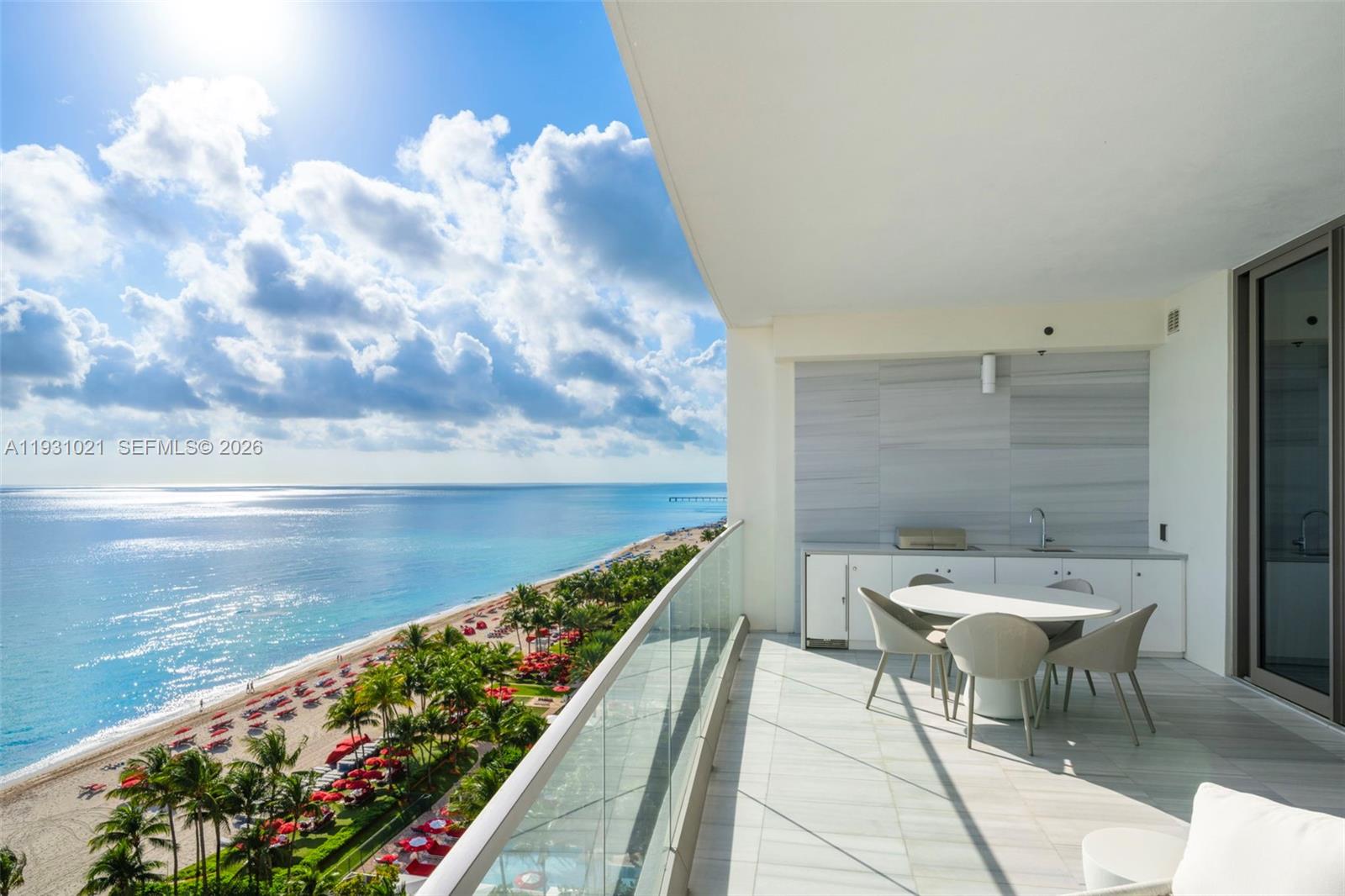 Coveted "Vecchio" residence at Miami's premier lifestyle property, The Estates at Acqualina. Spacious flow-thru with 4 bedrooms plus family room. Luxurious finishes feature custom millwork, custom plaster walls, elegant lighting details, genuine marble floors, gold onyx primary bathroom with steam shower, chef’s kitchen with La Cornue gas range, and top-of-line appliances. Other fine details include ceiling heights of up to 10'6", an expansive oceanfront terrace outfitted with a summer kitchen/grill, and complete smart-home automation to conveniently control lighting, window shades, climate and audio/visual. Bar-none, Miami's most luxurious oceanfront enclave, amenities include Rolls Royce House Cars, five world-class restaurants featuring Avra, Il Mulino and Ke Uh, three pools complete with SurfRider and waterslide, daily breakfast, cinema, skating rink, bowling alleys, F1 and golf simulators, basketball court and more!